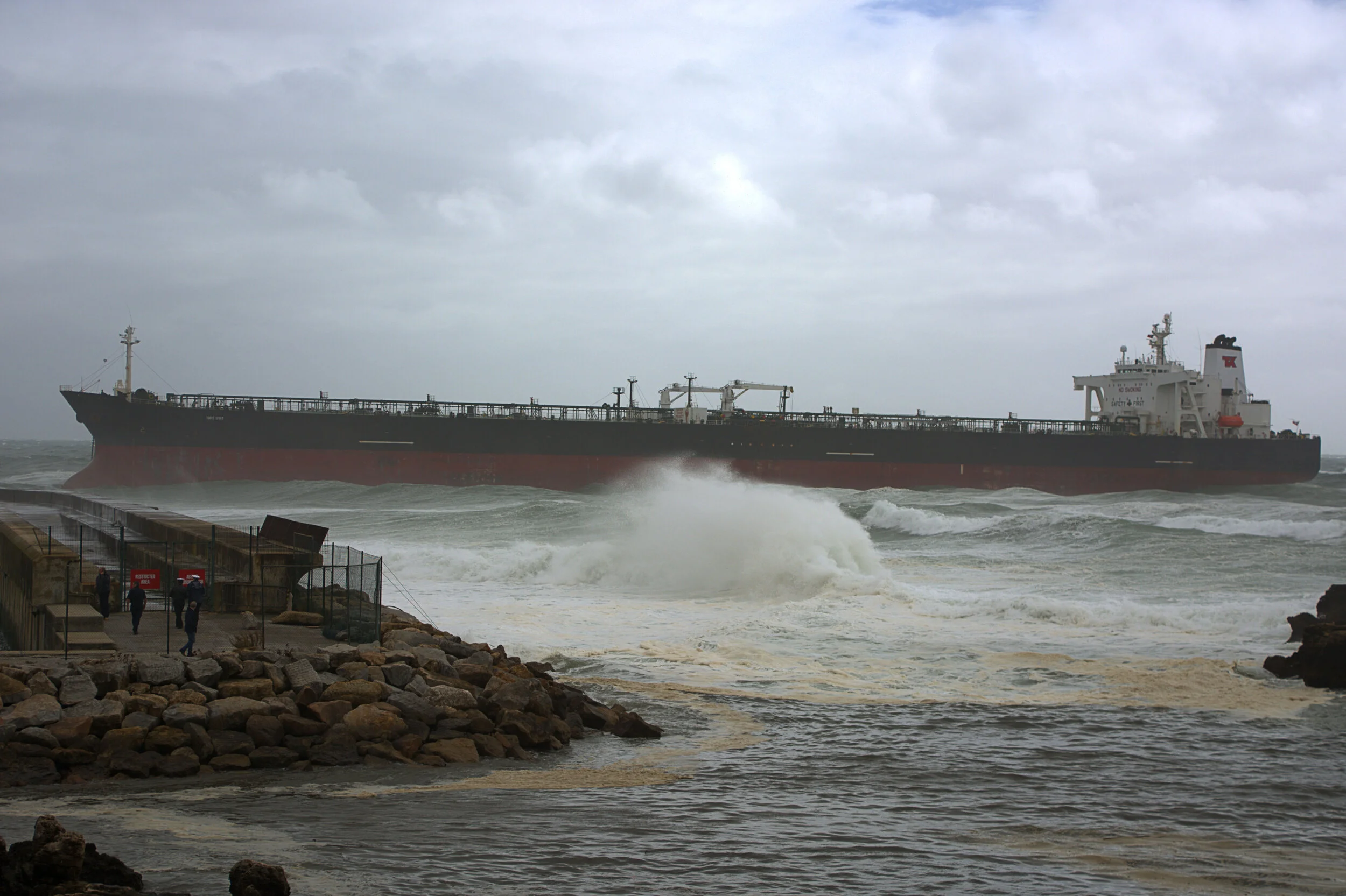 Cascais Bay, Portugal. Oct 2015.
Bahamas-flagged crude oil tanker owned by Teekay Tankers grounded in stormy weather  just outside the breakwater at the Cascais marina. 