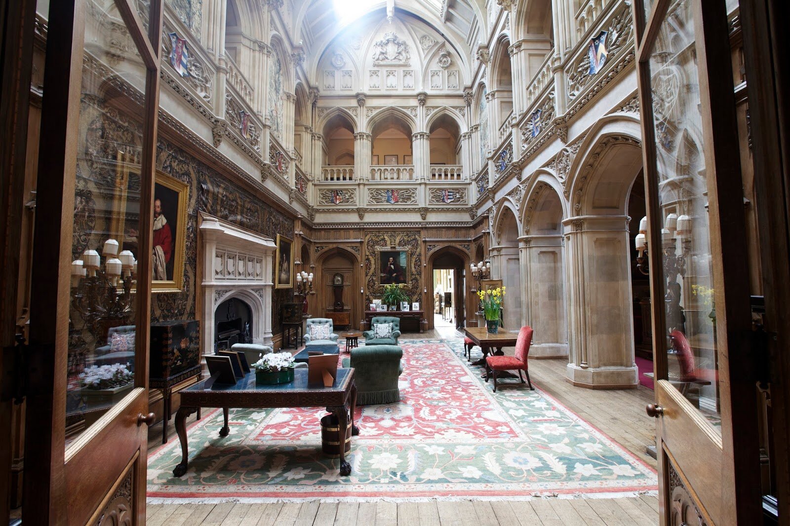 The Entrance Hall of 'Downton' is very masculine and typical of the era with its dark wood paneling and stone mixture. It is an impressive and imposing entrance with high vaulted ceilings, intricate stone work and vast floor space. I dread to think …