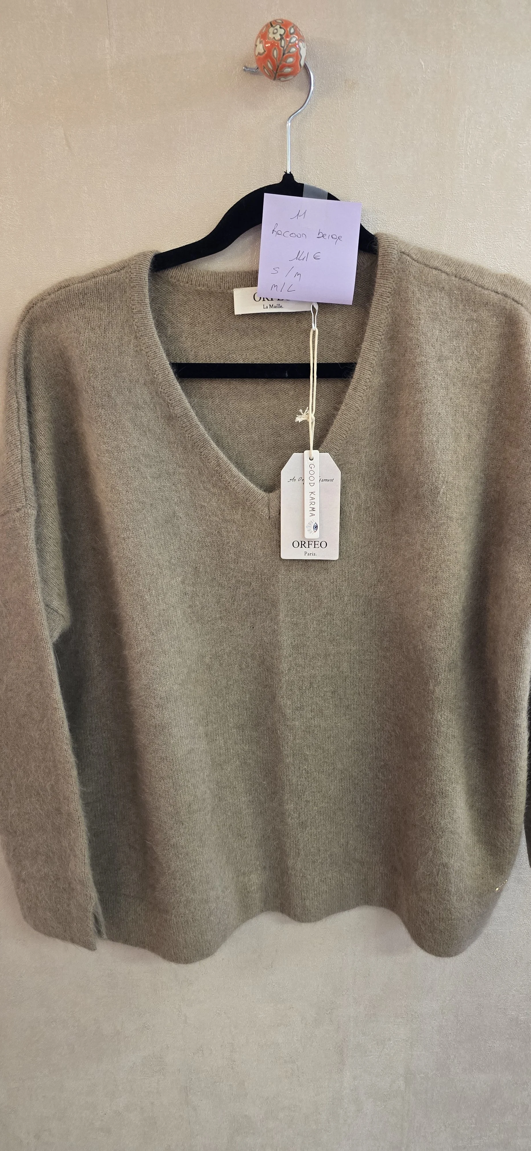 Pull racoon col V beige