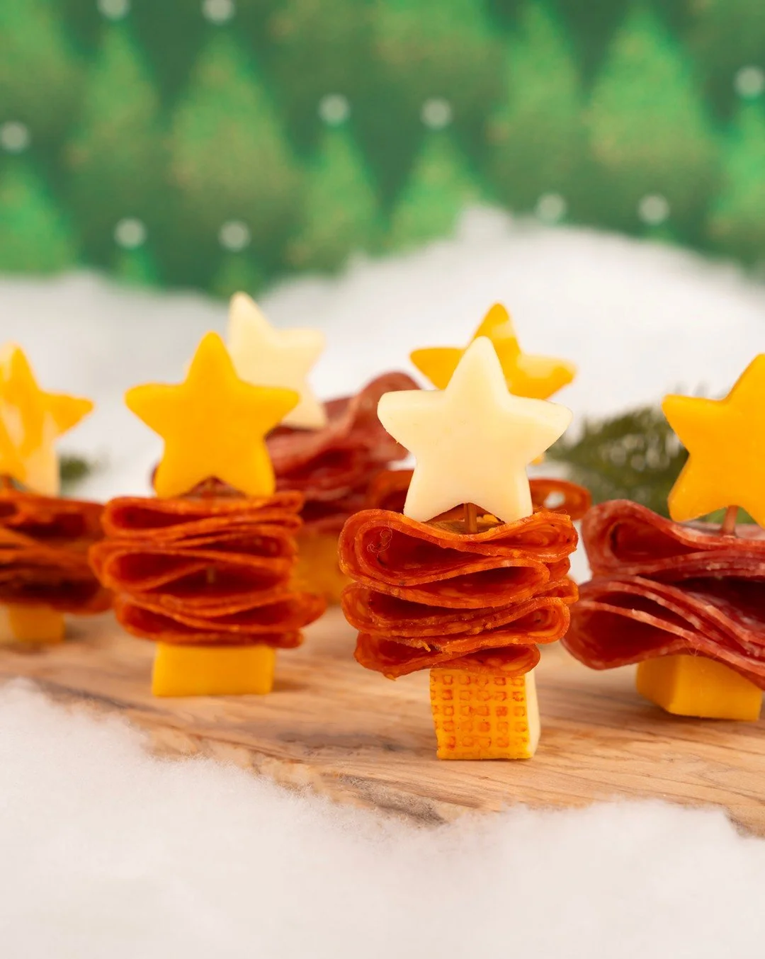 Christmas tree bites made the New Bridge way. 🎄 Built with pepperoni, salami, and our creamy Muenster, colorful Colby Jack, and crowd-favorite Mild Cheddar!