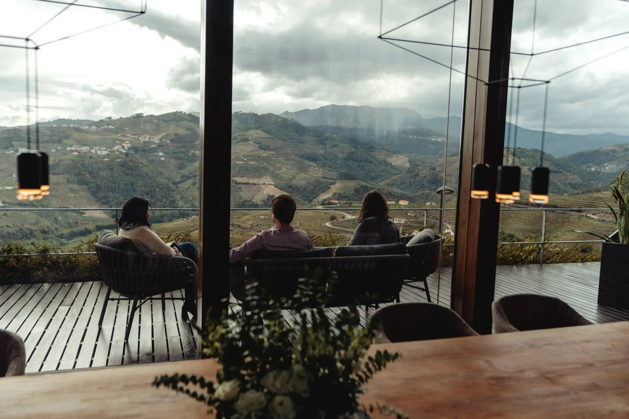 Guests looking out over the Douro hills from the H.O. tasting room.