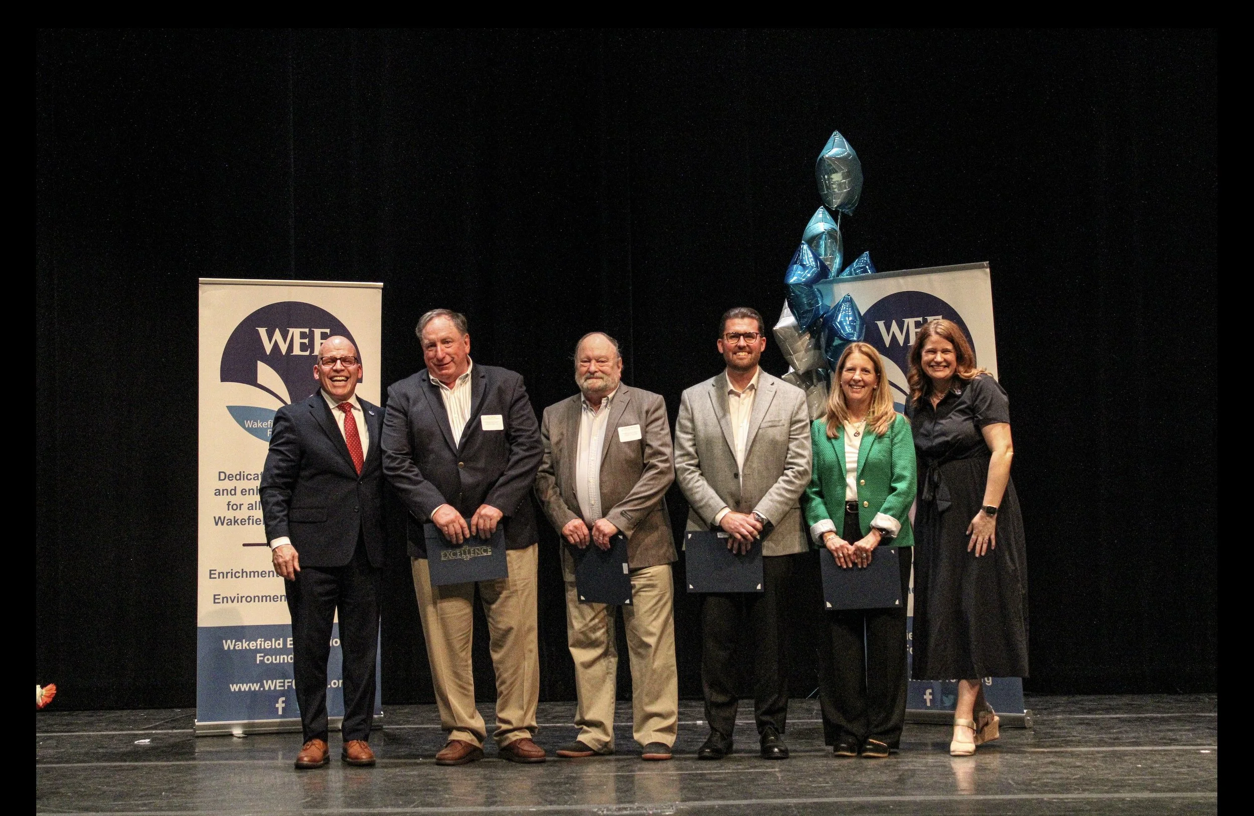 WEF honors Community Award to Chip Tarbell, Joe Bertrand, Tim O’Brien, and Amy McLeod