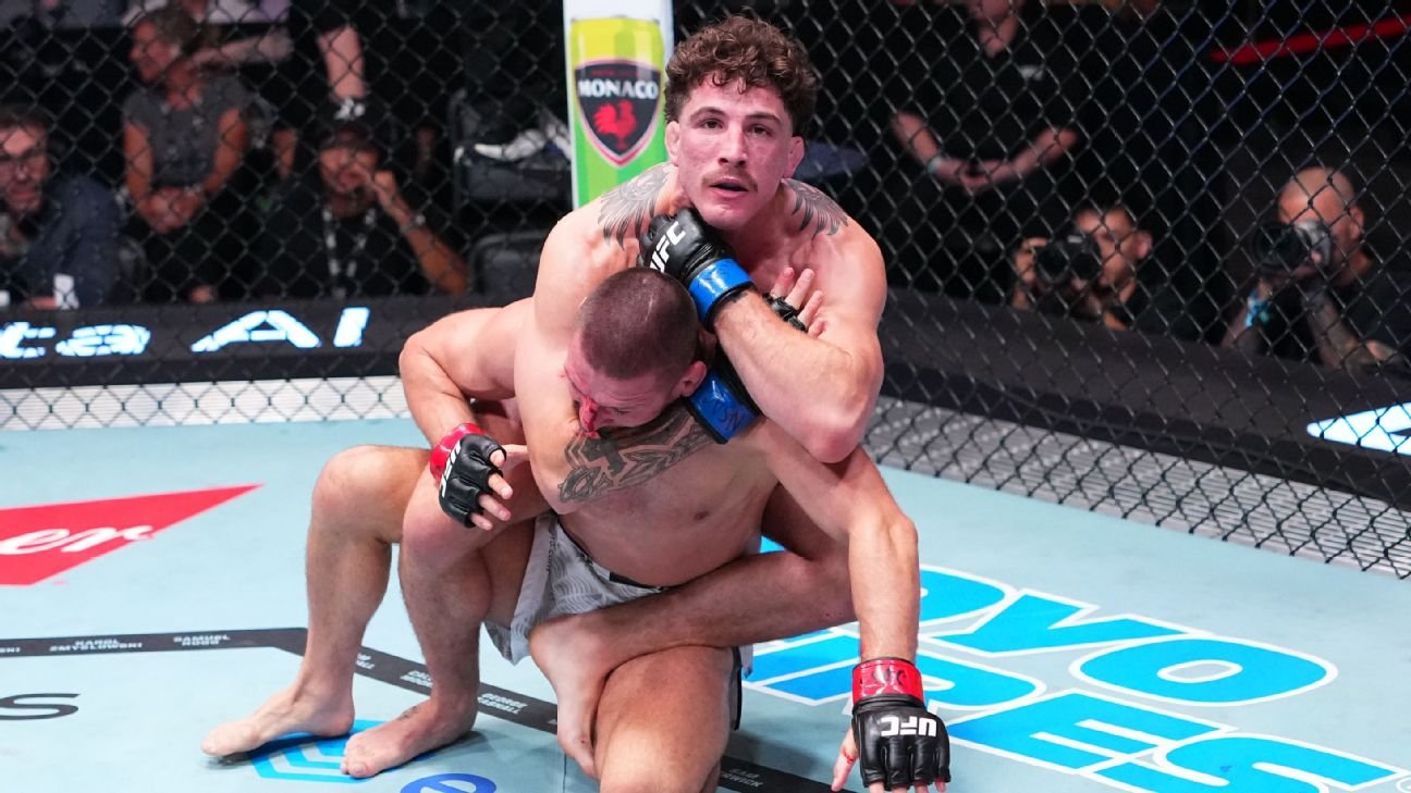 UFC 330 - Quillan Salkilld sinking in the choke for the win.