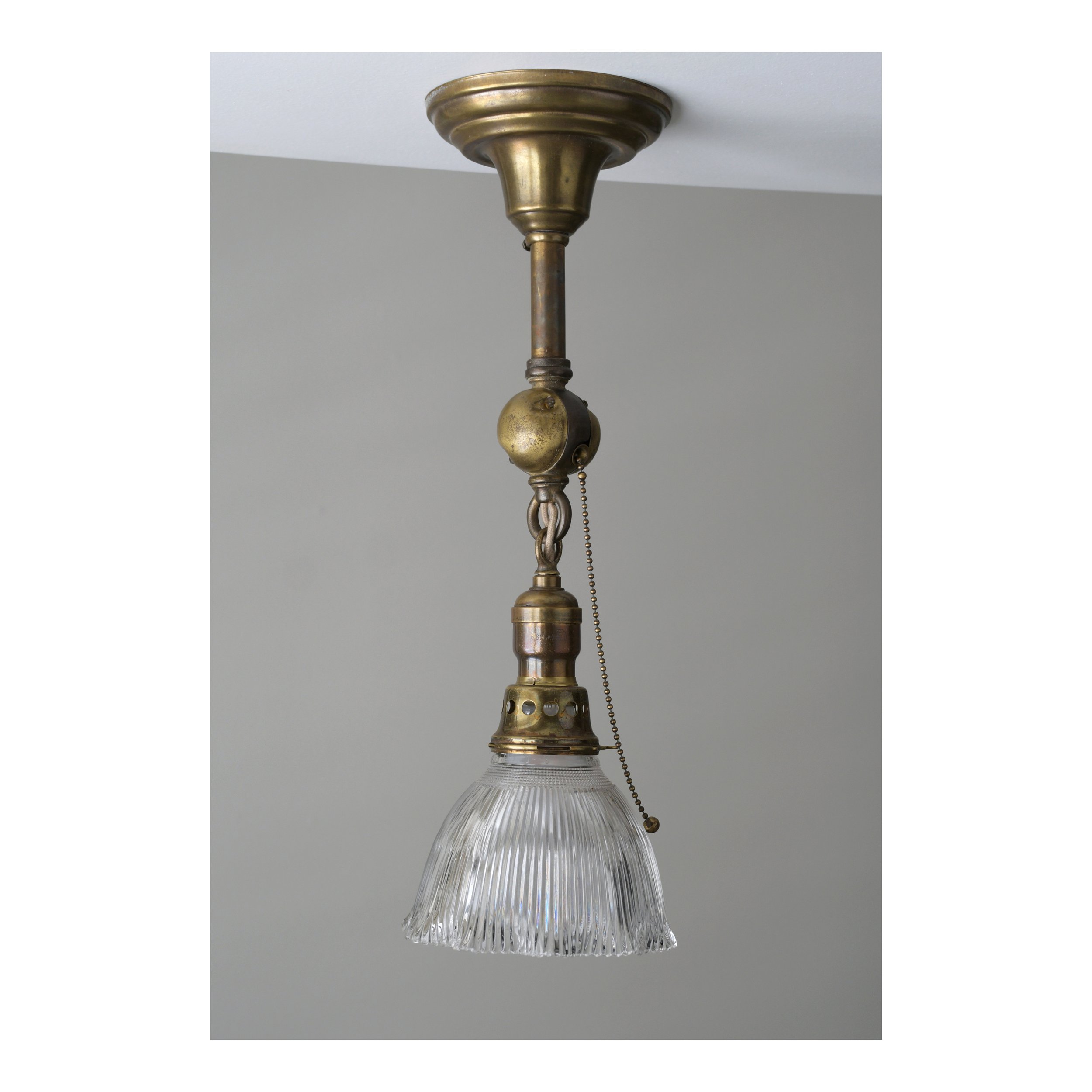 Antique - Brass ceiling pendant with pull-chain. Holophane shade