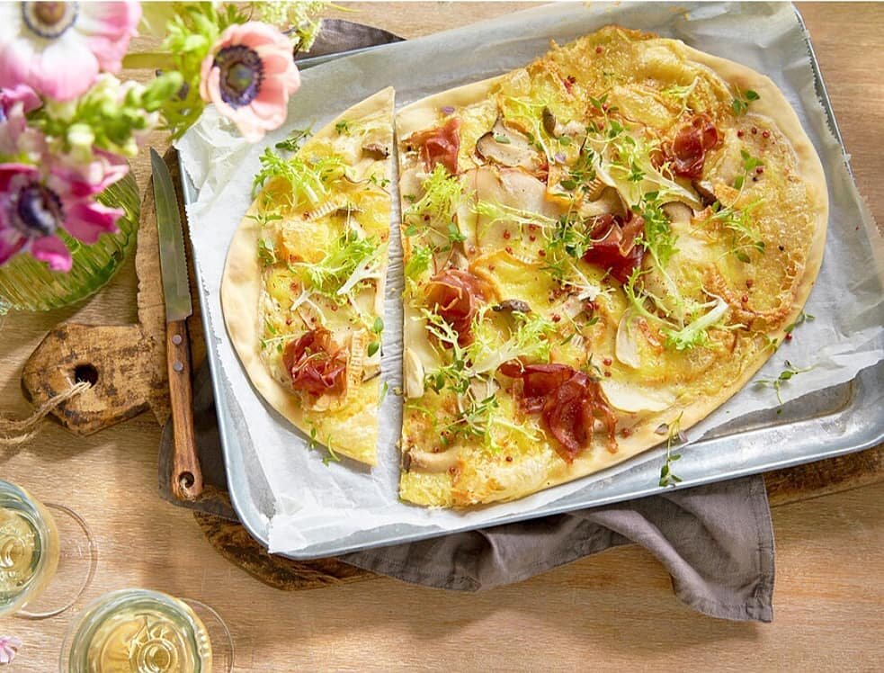 This Alsatian Tart makes a gorgeous appetizer or light main dish, topped with pears, Serrano Ham and irresistibly creamy Bavarian Red.

Visit our website for the delicious recipe.