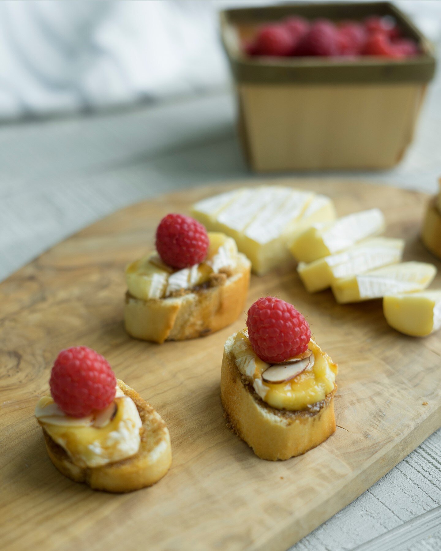 Raspberries and honey transform Briette Creamy &amp; Mild  cheese into the perfect bite-sized dessert. Layer them on sliced baguette and toast them in the oven for an easy-yet-elegant weekend treat. ⁠
⁠