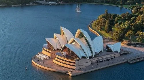 The Sydney Opera House in Sydney, Australia 🇦🇺, redefined what architecture could represent on a global stage. Designed by Danish architect J&oslash;rn Utzon, the project challenged conventional engineering and construction methods with its now-ico