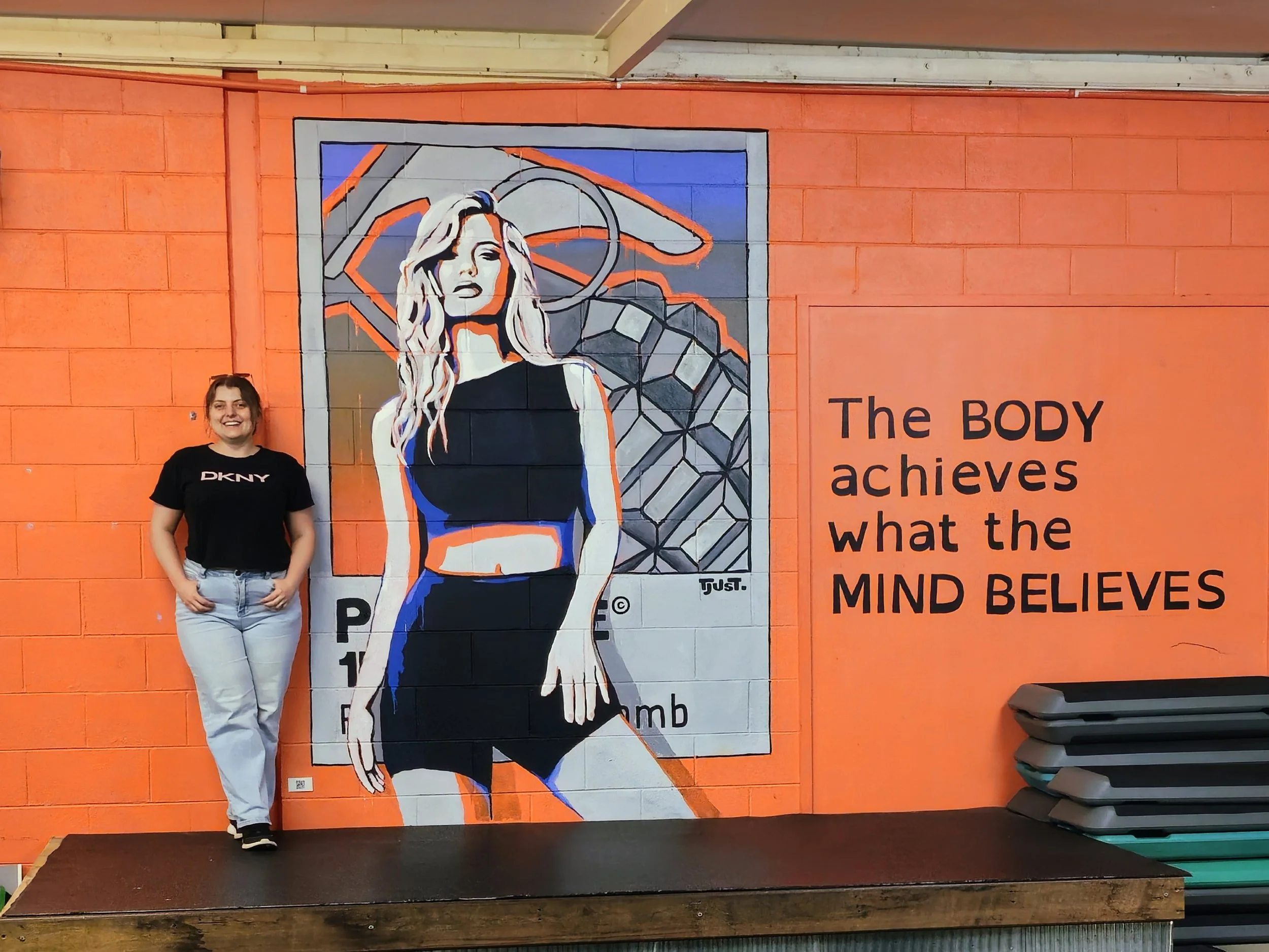 CONTEXT Finished mural and artist