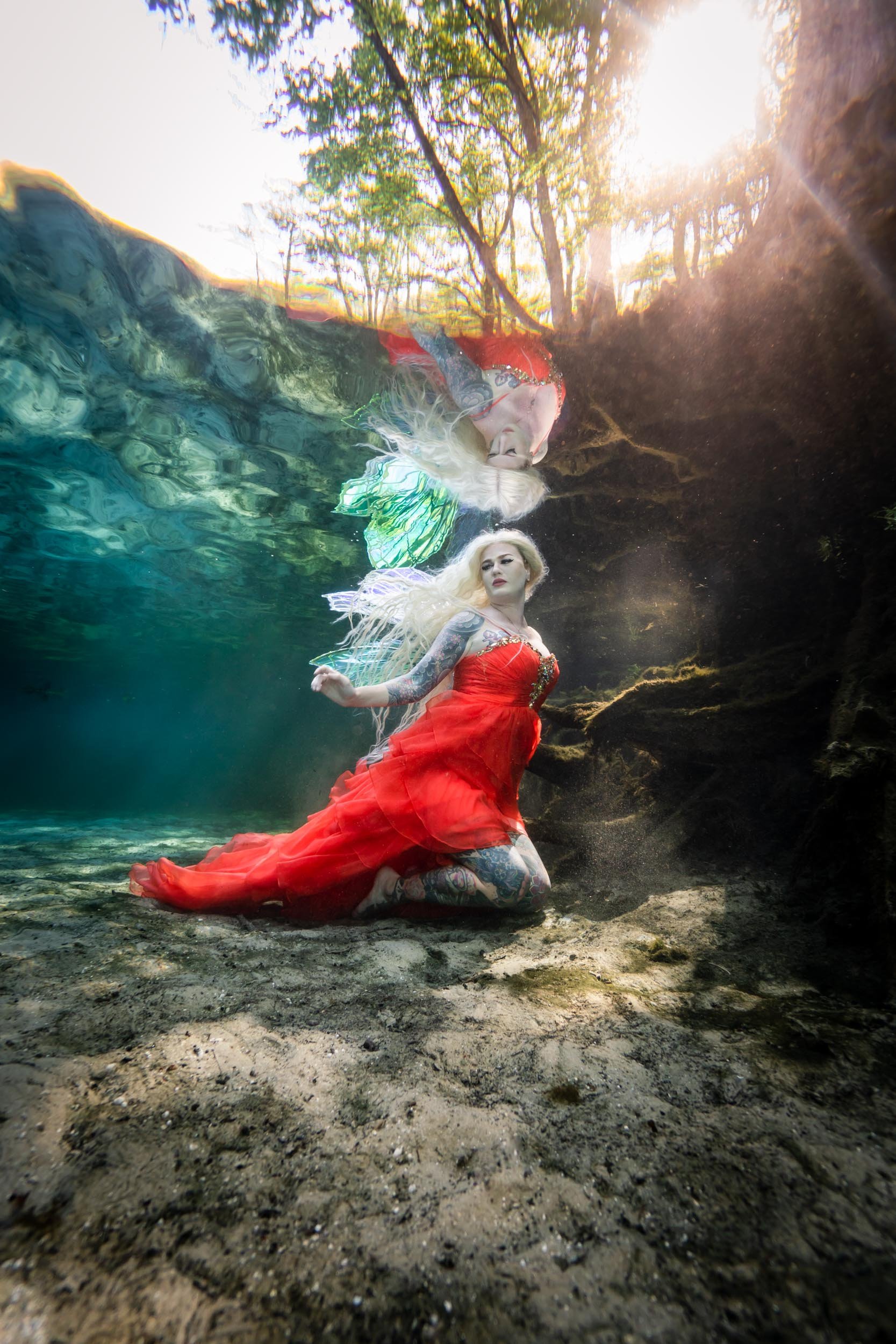 Underwater model in her fairy wings