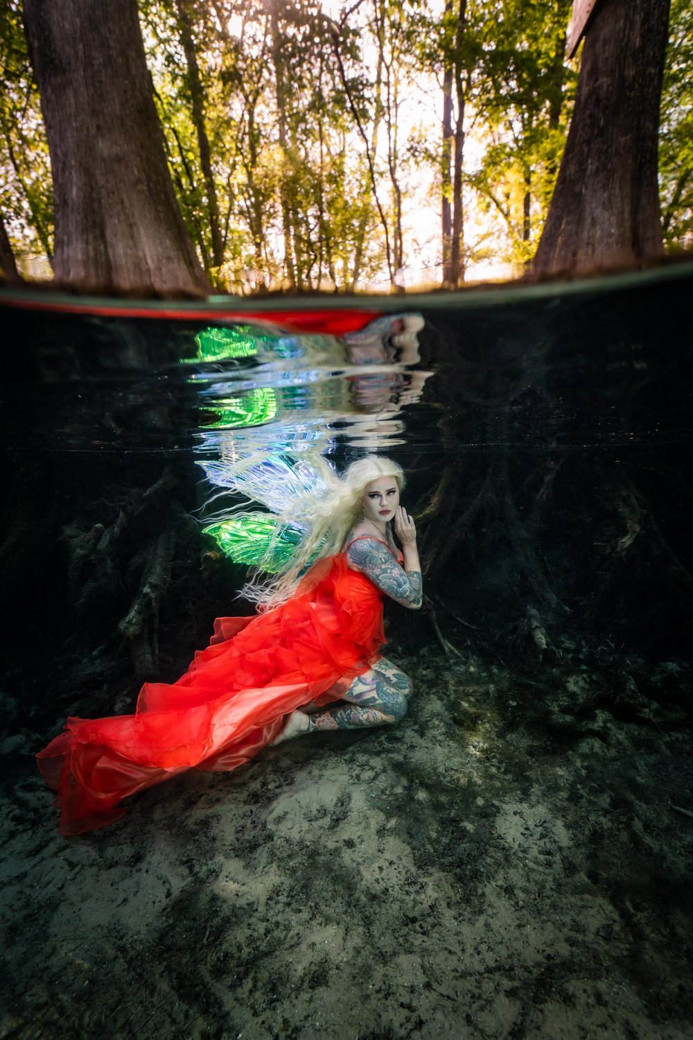 Underwater model in her fairy wings