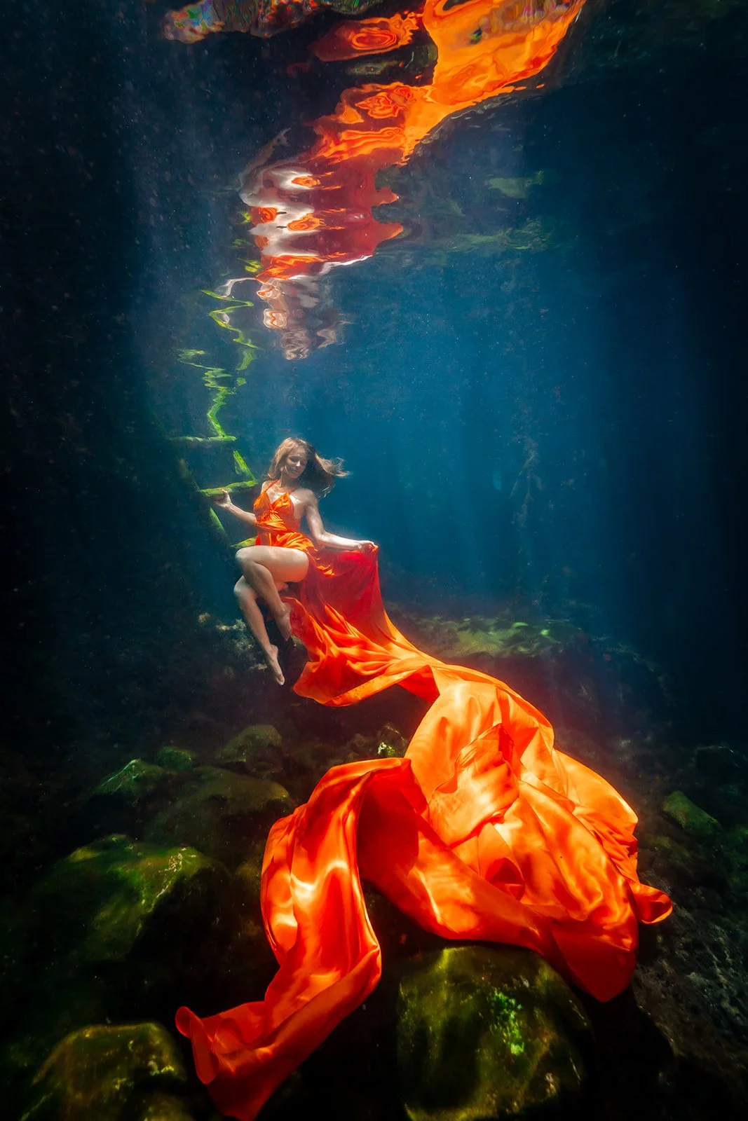 Underwater photography with flying dress