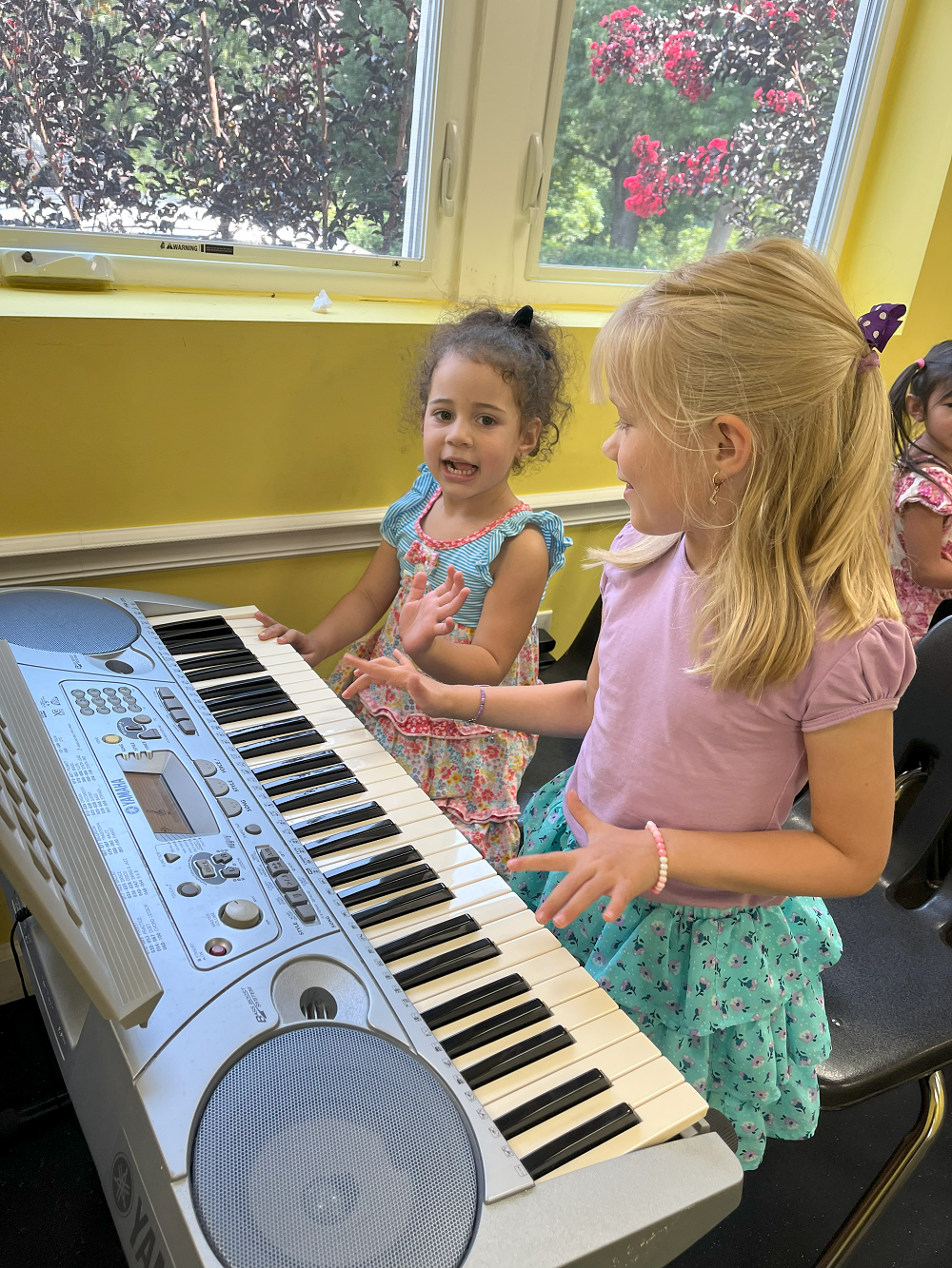 Olenka School of Music students at keyboard class.png