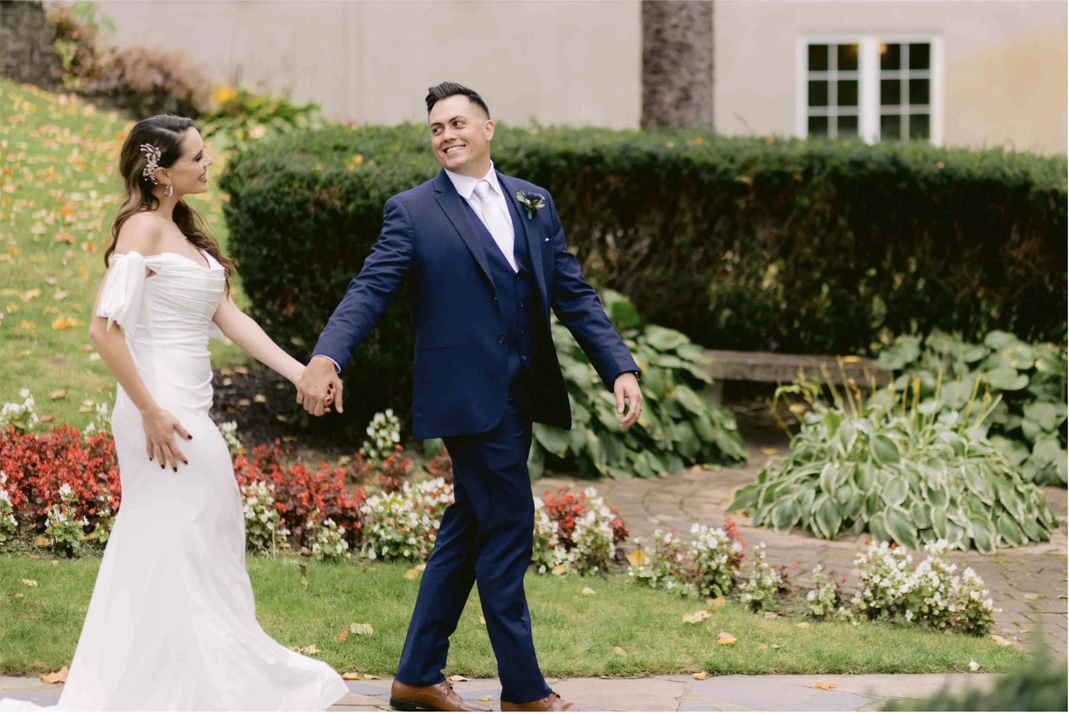 Wedding couple walking and holding hands