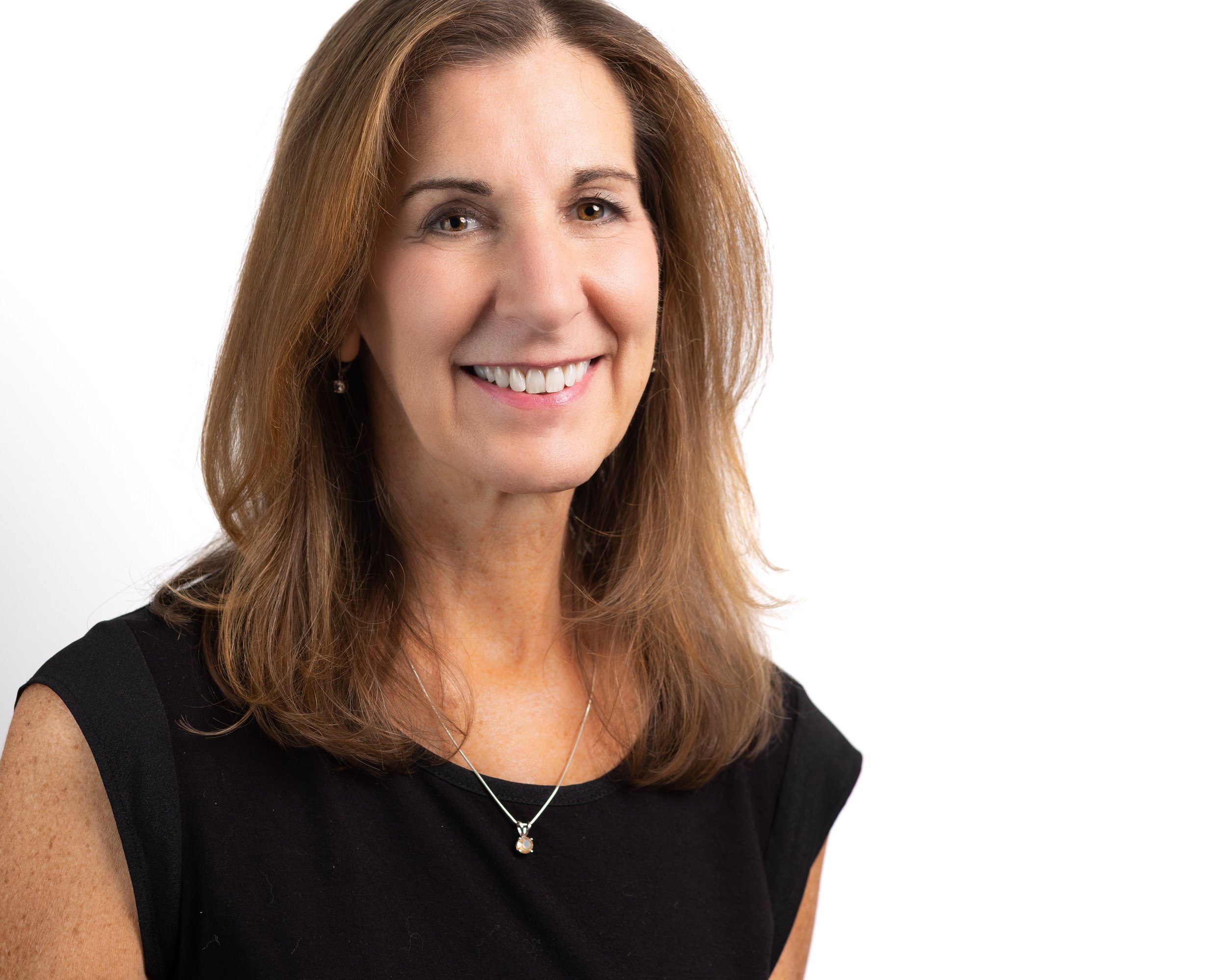 Headshot of woman in black shirt Lansing, Michigan