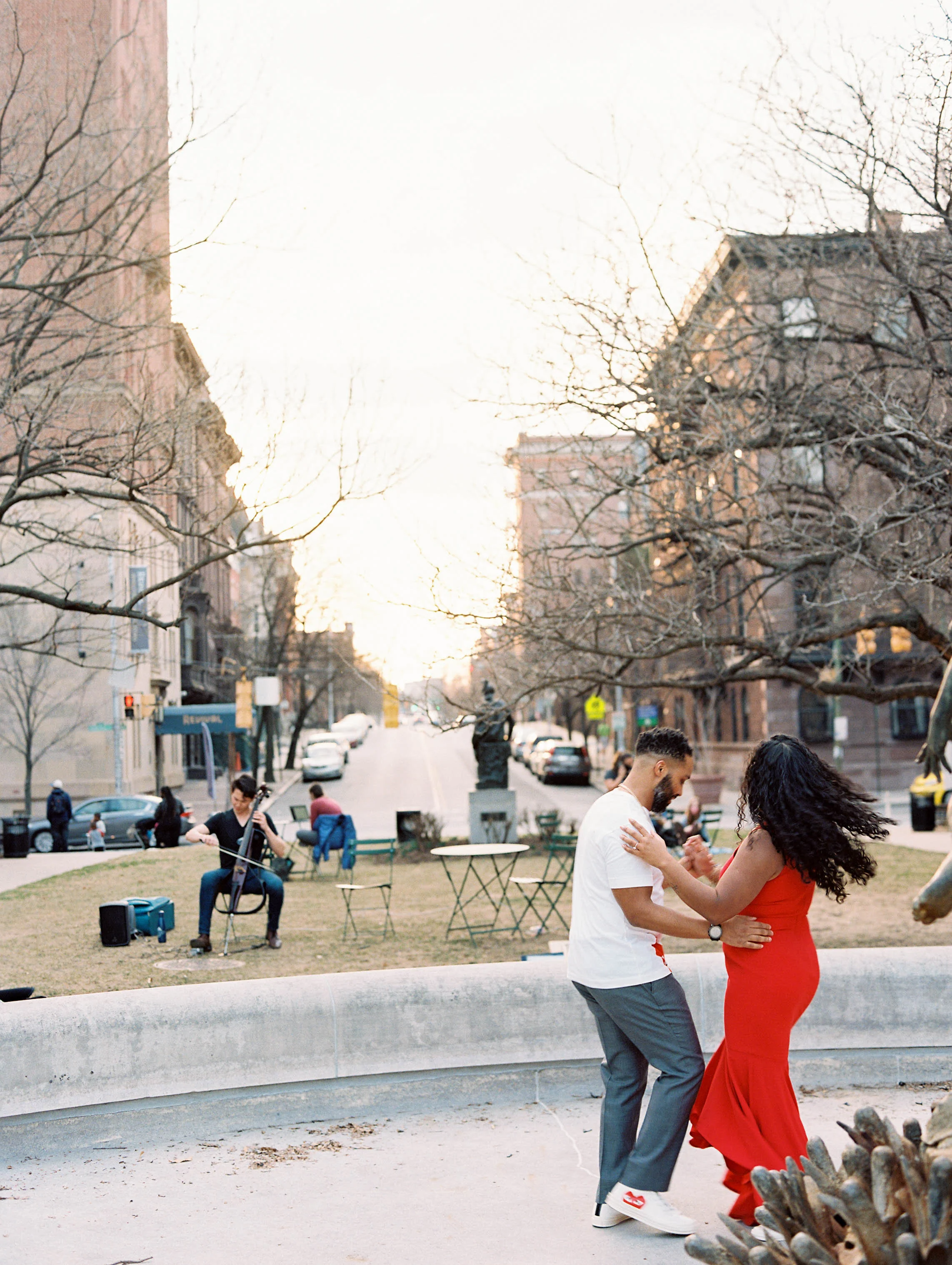 Engagement session and dancing in the park in the Baltimore neighborhood of Mount Vernon