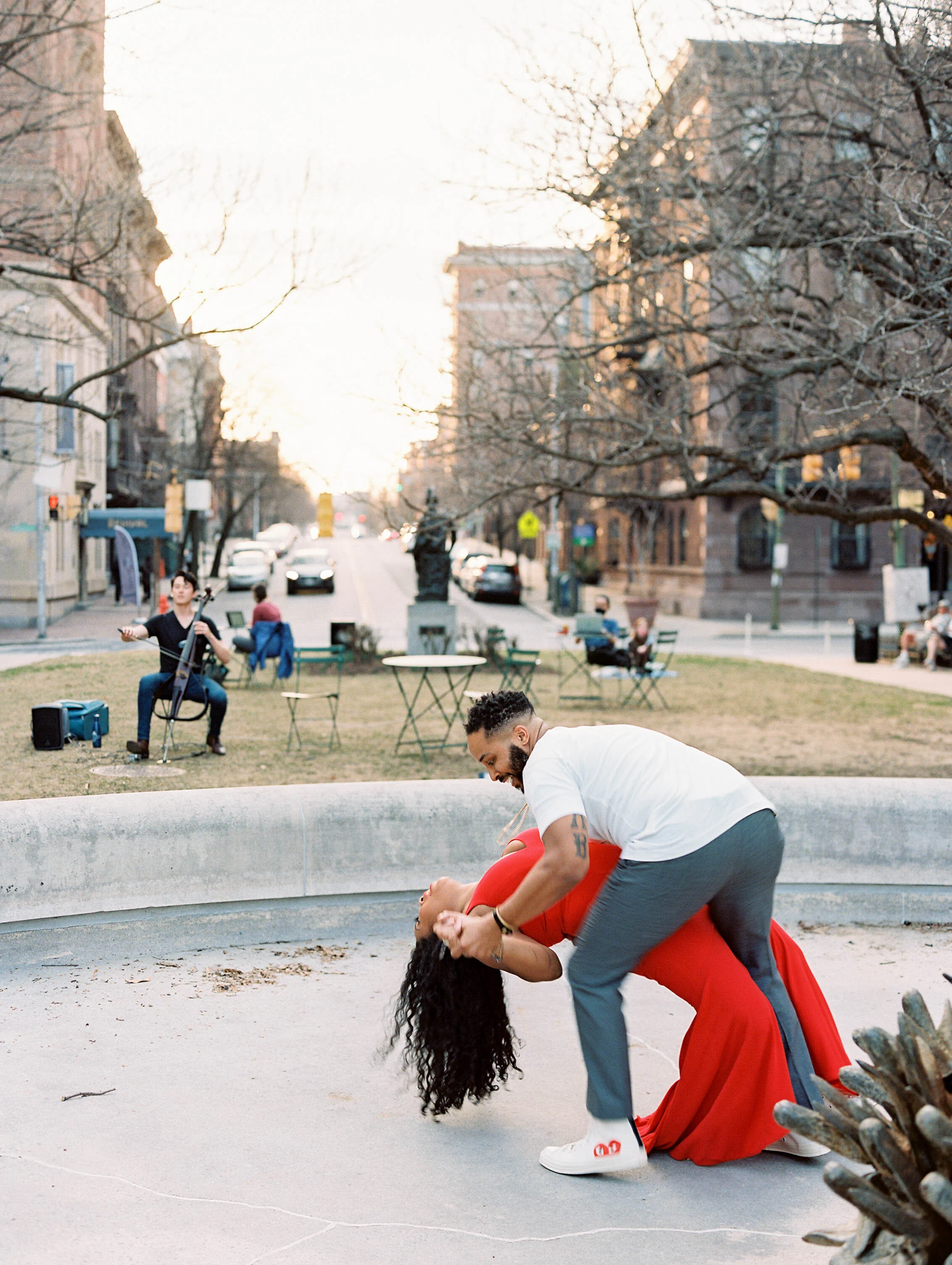 Engagement session and dancing in the park in the Baltimore neighborhood of Mount Vernon