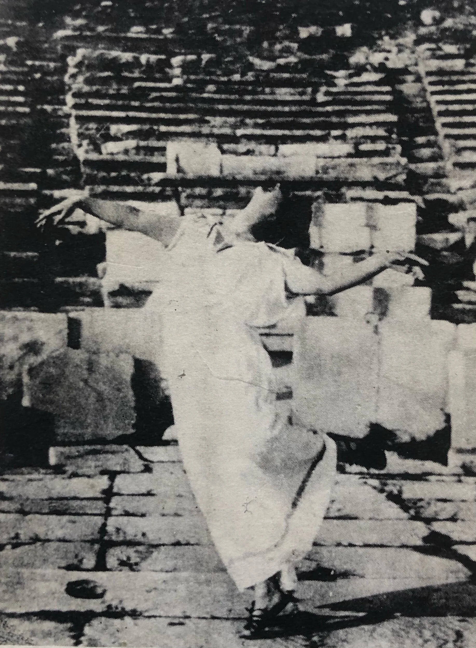 117: Isadora Duncan dancing in the Theatre of Dionysus, Athens. Photograph by Raymond Duncan.