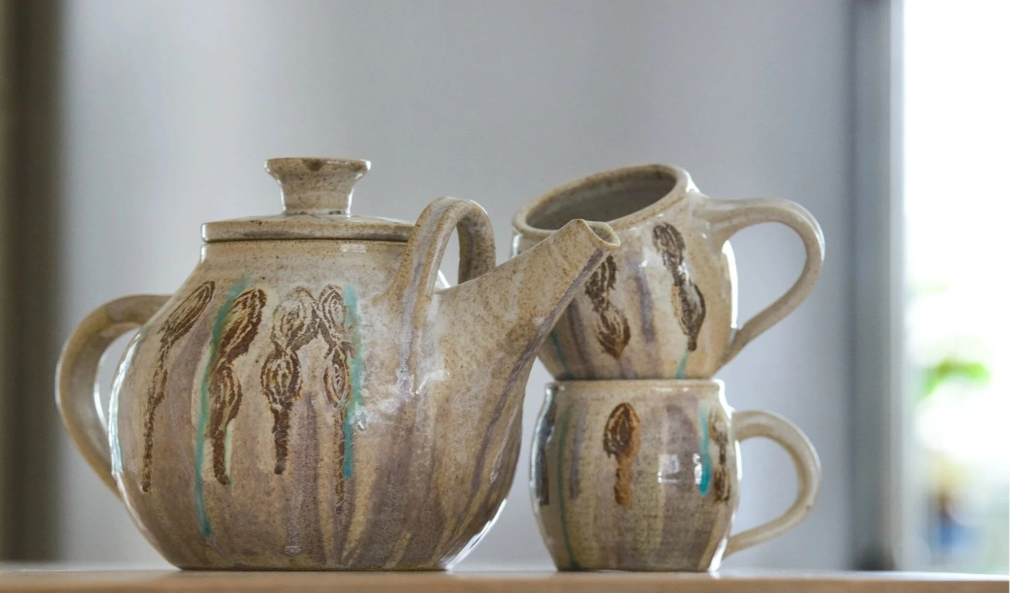 Tea for Two. Wheel-thrown, stoneware tea set, with sgraffito and glaze decoration.