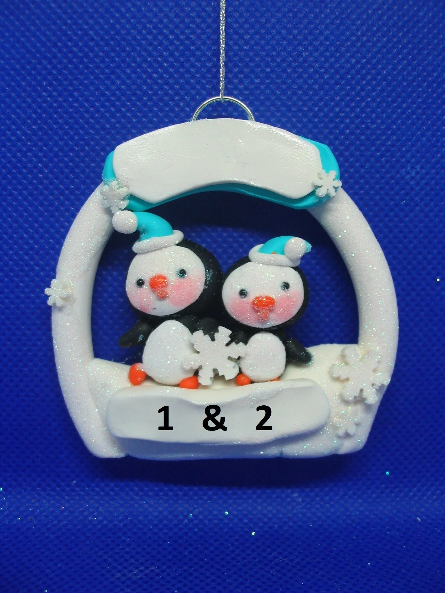 penguin couple in igloo - NUMBERED.jpg
