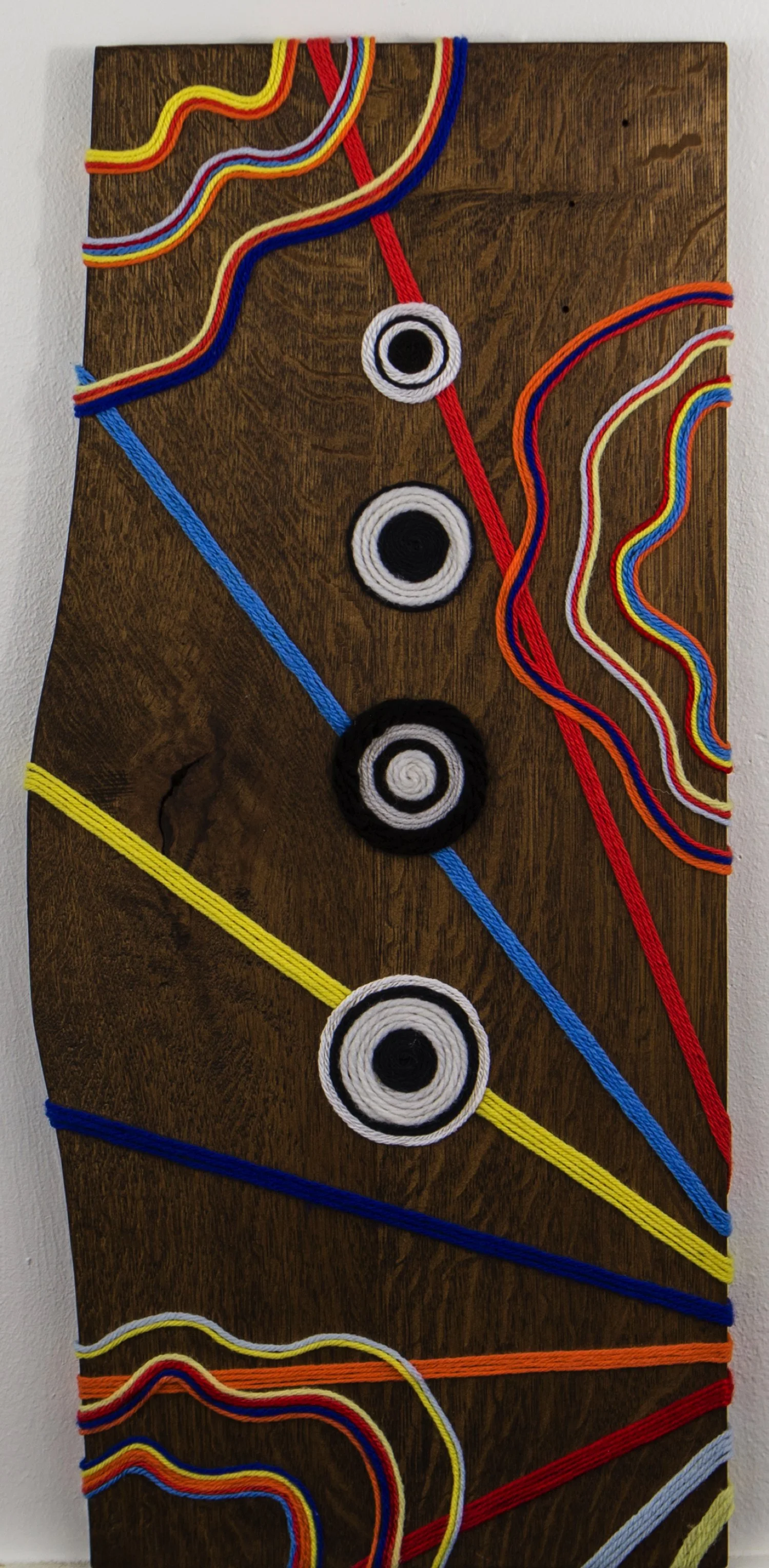 "Taco Tuesday" by Justine Nolt, Yarn on Wood, 26 x 12 ($175)