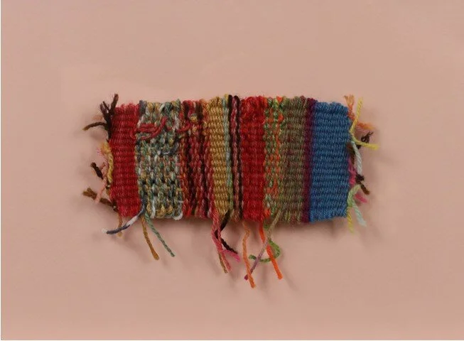 "Fall in Snake River" by Molly Hale, Tapestry weaving of acrylic and cotton yarn, 2.5 x 5.5" ($50)