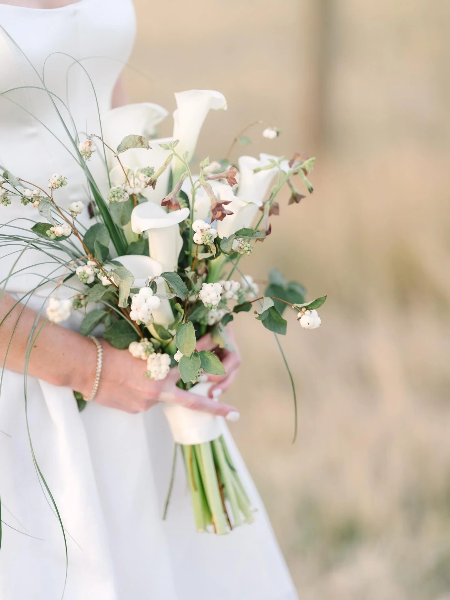 classically your own 🤍 
.
we are in love with her style and her bouquet.
.
more details of this day coming soon!
.
.
Photography: @rodeoandcophoto 
Planning &amp; Design: @bijouweddingsbydesign 
Venue: @firelightfarmmt
