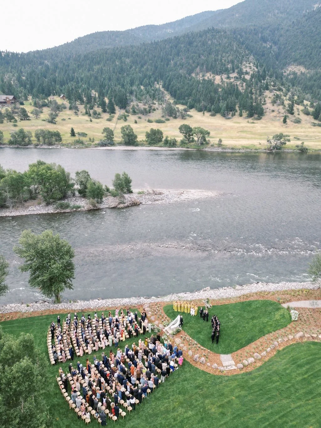 Summertime on the riverbank of the Yellowstone 🤍
.
.
.
.
Planning &amp; Design: @mariee_ami
Photography: @elizabethlanierphotography
Videography: @lightcannonfilms
Dresses: @crisserrastudio
Florals: @thewildblume
 Cake: 
@ellesbellesbakery
 Catering