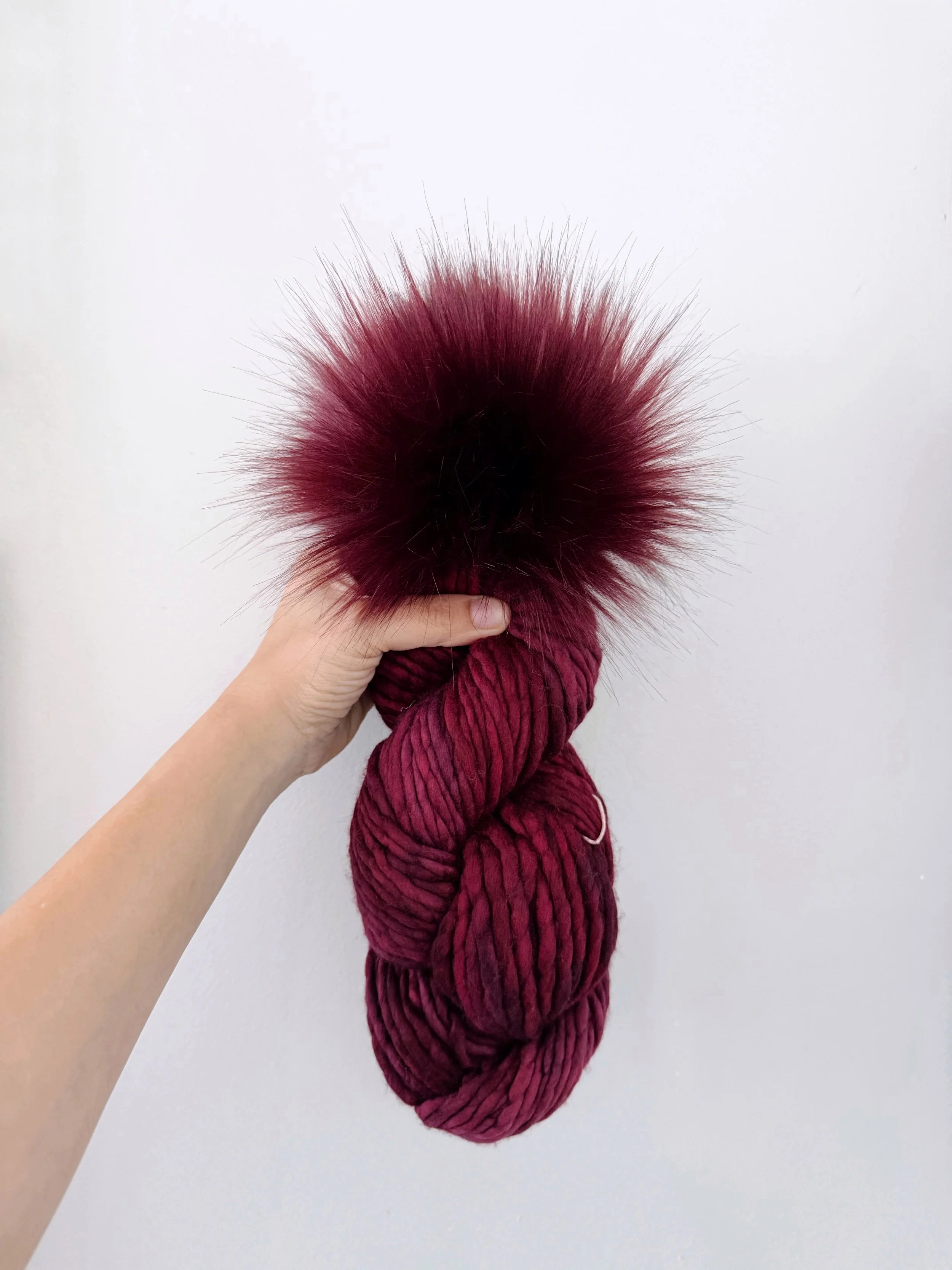 Rasta in Stitch Red + Merlot Pom