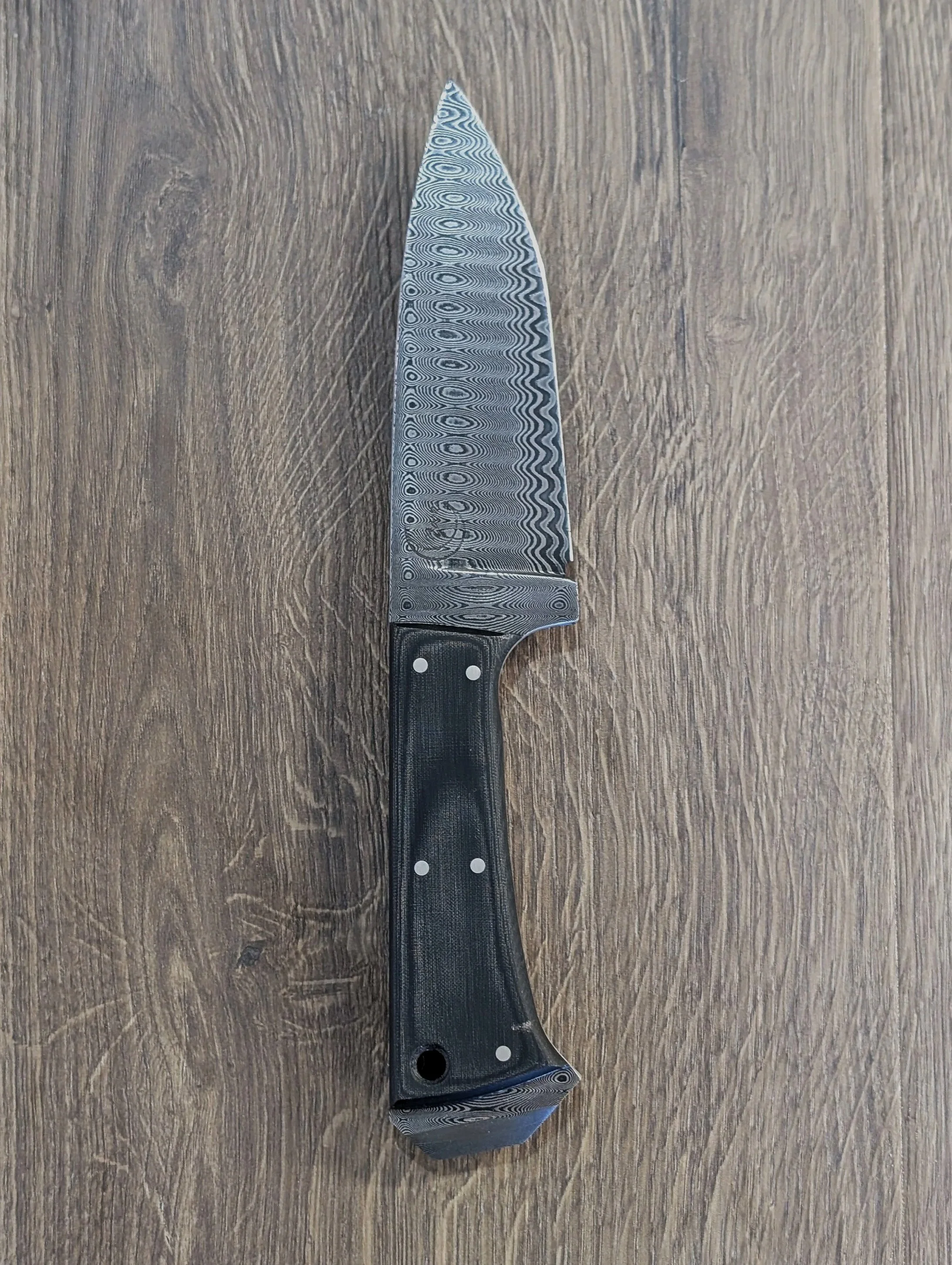 4" Buschcraft | Damaworks banded carbon damascus | Black linen micarta handle scales | Black kydex sheath