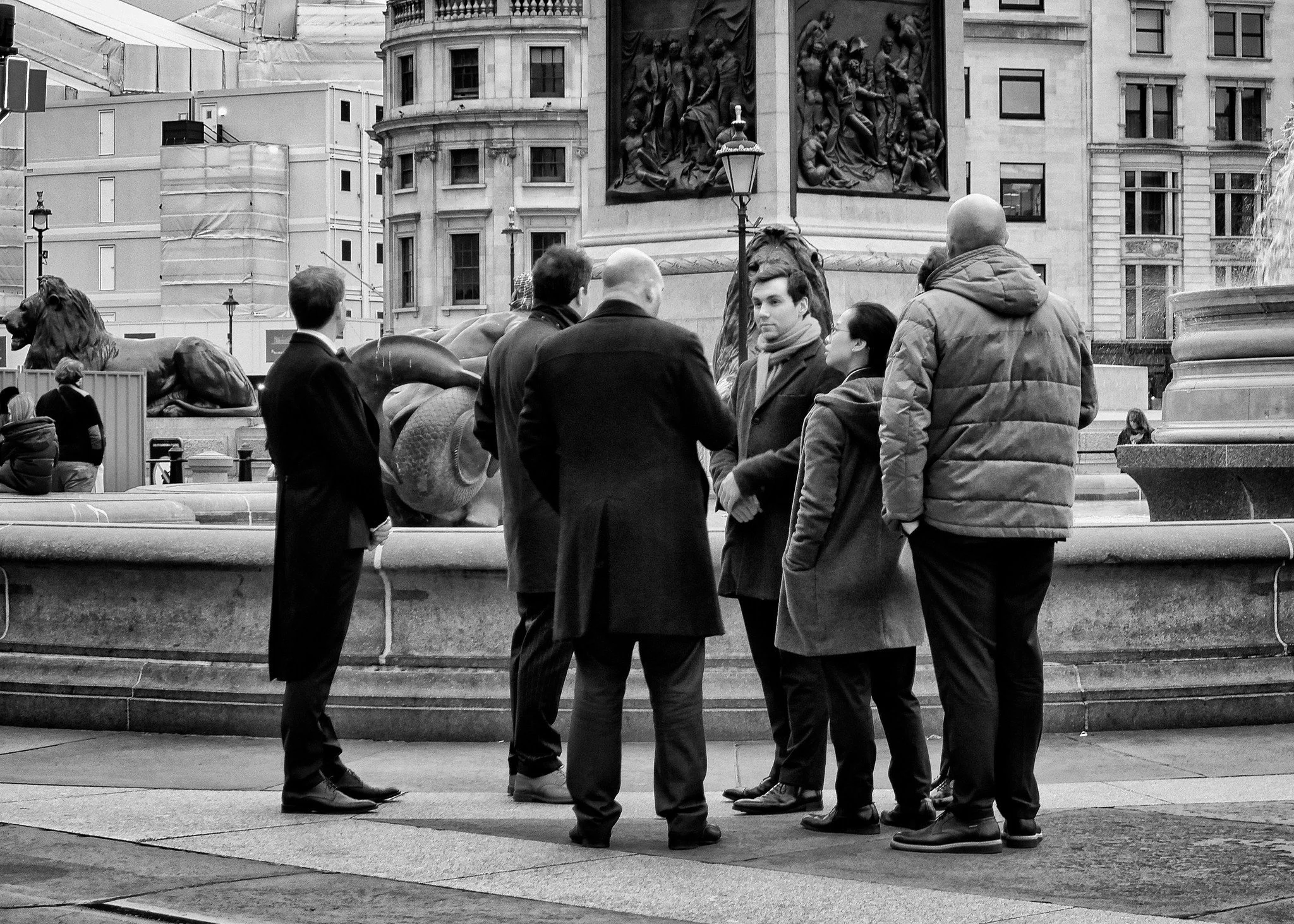 A group of people in Trafalgar Square