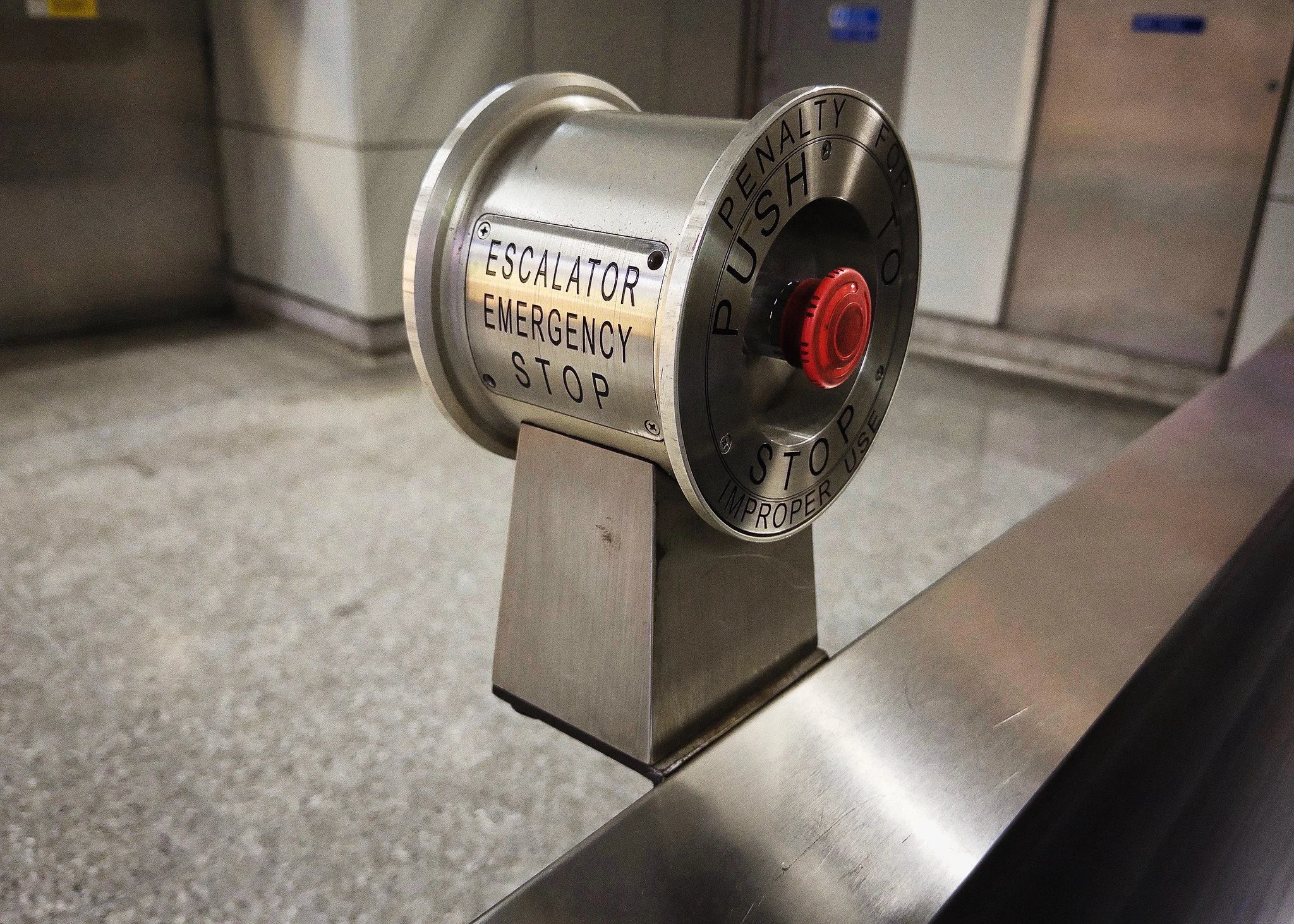 Escalator emergency stop button