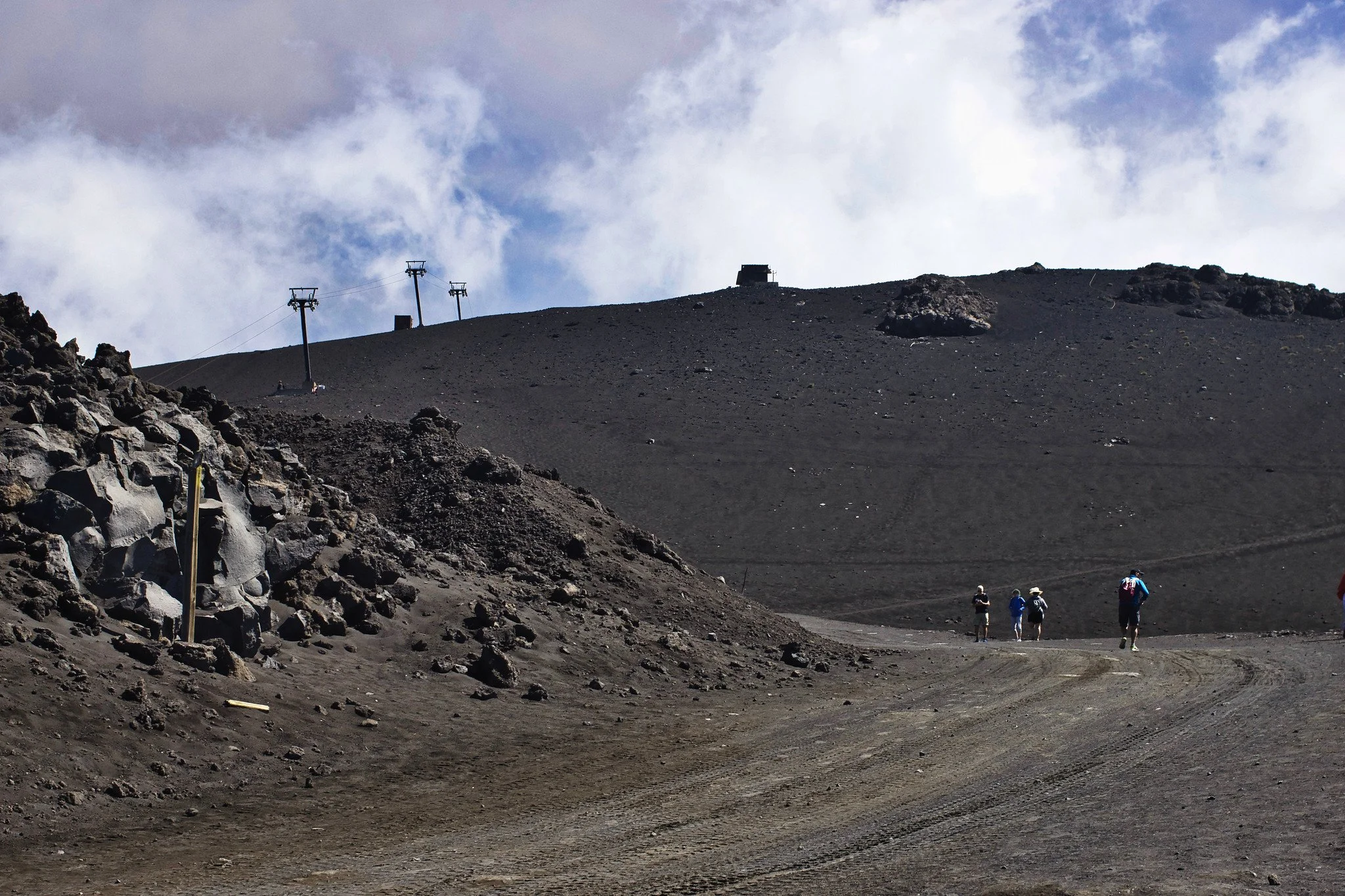 Volcanic landscape with pylons