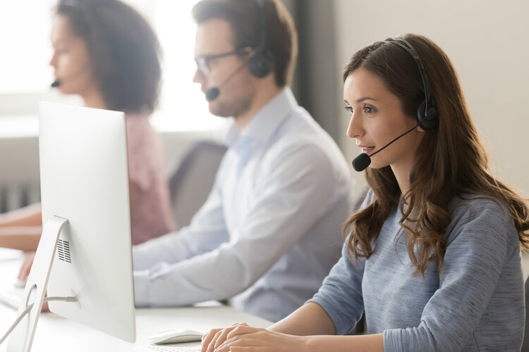 Multiple agents working happily in a customer service contact center