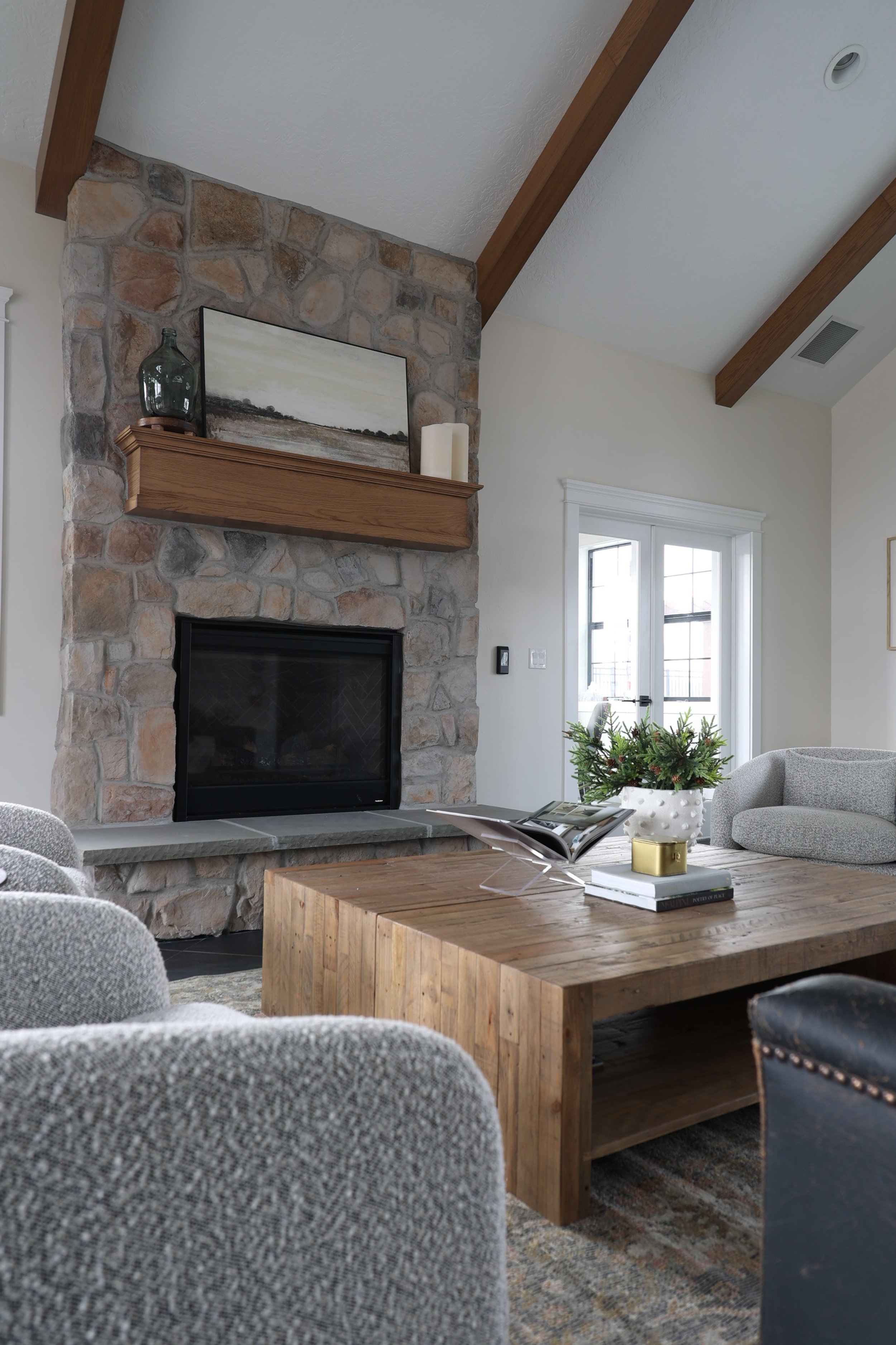  Stone fireplace in a new build home by Liz Powell Design in Logan, Utah Cache Valley. how to design a new home build pick the right sheet rock for your walls #LizPowellDesign #LizPowellInteriorDesign #BuildingaHome #dreamhome #interiordesigner #Cach