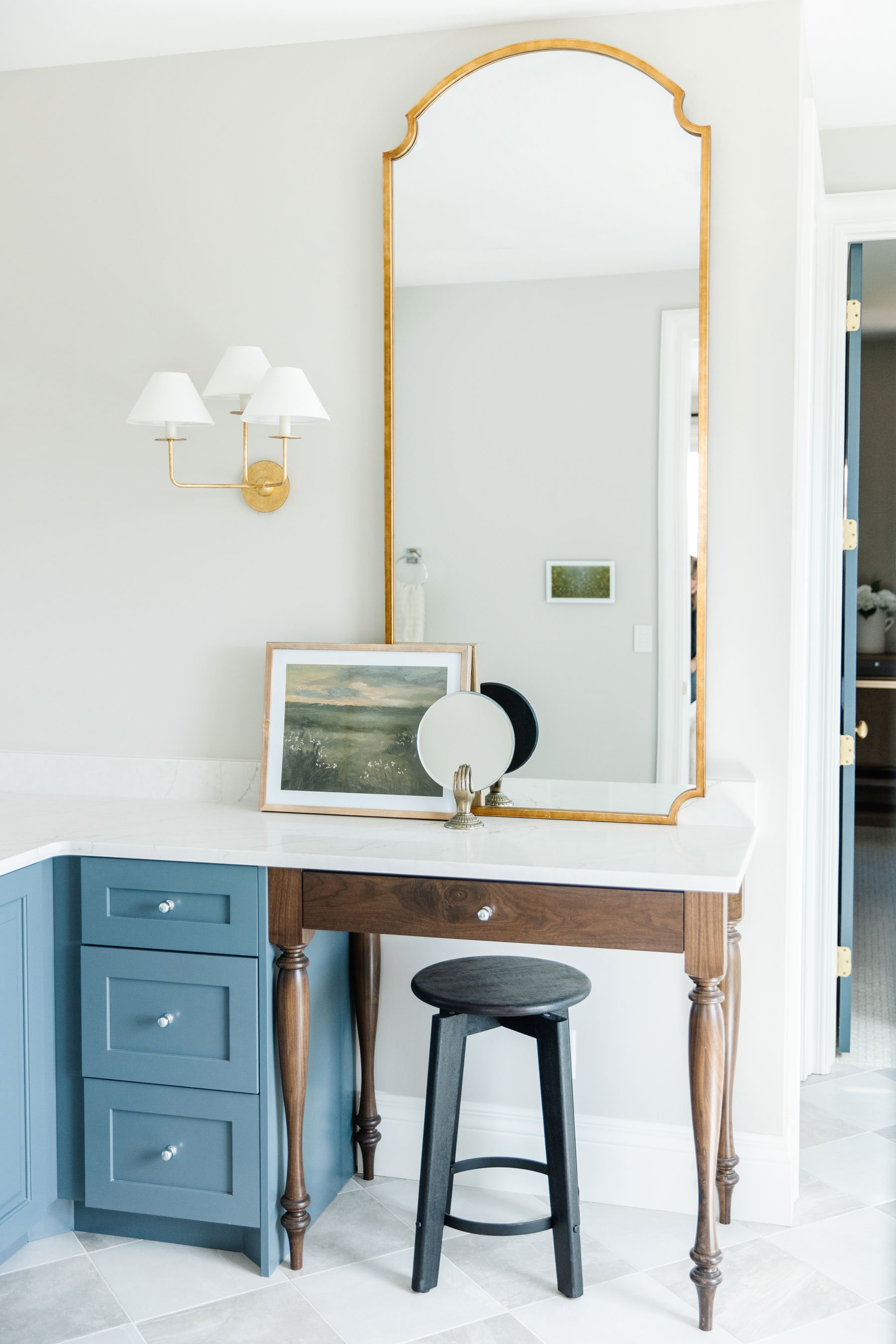  This bathroom uses a beautiful combination of modern and vintage woodwork to make it one of a kind. Antique vanity blue cabinets bathroom cabinets #antiquetable #uniquebathroomvanity #sentimentalstatementpiece 