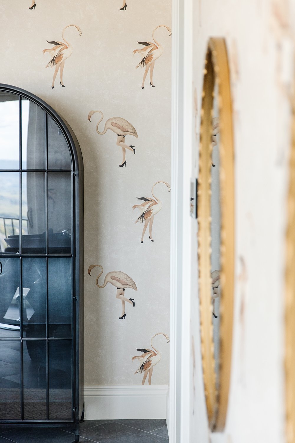  Liz Powel uses wallpaper to bring personality into a room without much effort. Flamingo wallpaper European style gold mirror Liz Powell designs girls bedroom #europeanwallpaper #flamingos #girlsbedroom #Loganutahinteriordesign 