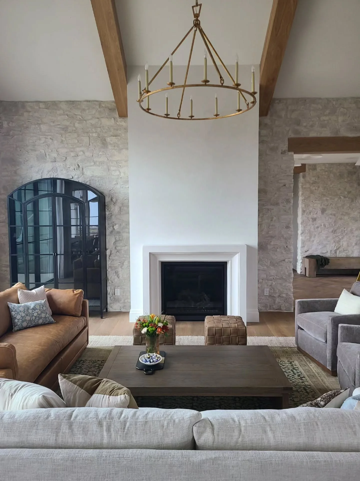 One of my favorite things about this living room is that we opted for a beautiful cabinet instead of a more traditional built-in next to the fireplace. 

Sometimes, a bunch of cabinets and floating shelves just seem heavy.  I love the more curated lo