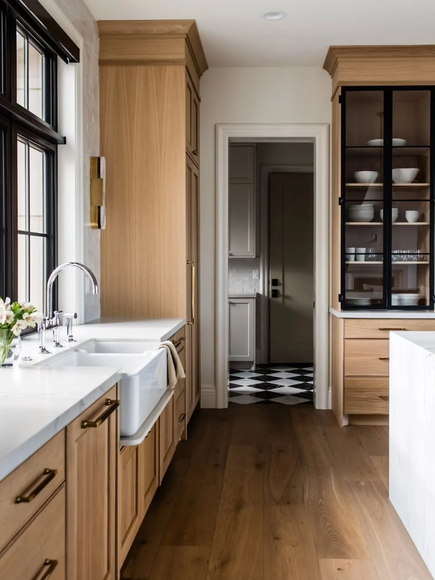 First glimpse at our newly completed #pieceofparadise project. 

Let's start with the kitchen. 
-White oak cabinets, 
-Quartzsite countertops, 
-Polished chrome fixtures, 
-Beautiful metal cabinet doors.

This house has the perfect balance of traditi