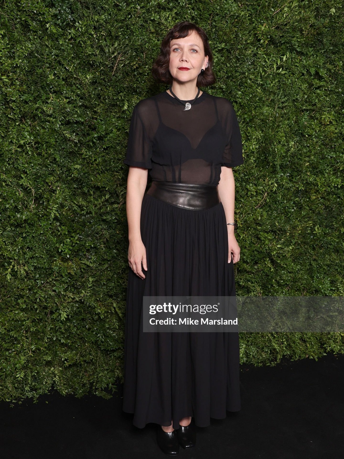 ✨ @mgyllenhaal wore a @katehundley Spring 2026 Sculpted Sheer T-Shirt and Leather Waist Skirt to the Charles Finch &amp; Chanel 2026 Pre-BAFTA Party on February 21. Styled by @sandraamador.xx | Image credit Mike Marsland/ Getty images