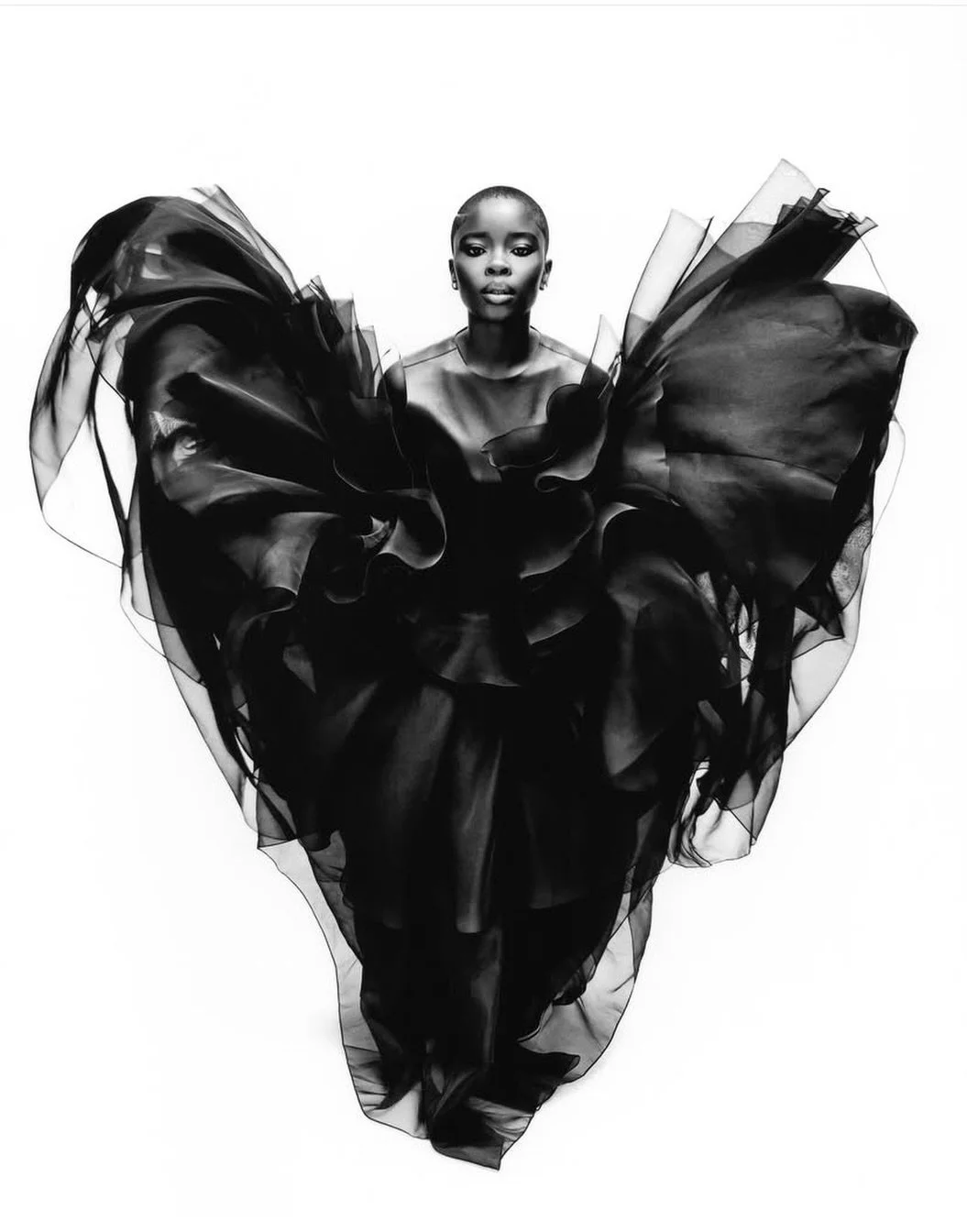 🤍 @joysunday wears @temilyofficial gown and @katehundley top in @numero_netherlands