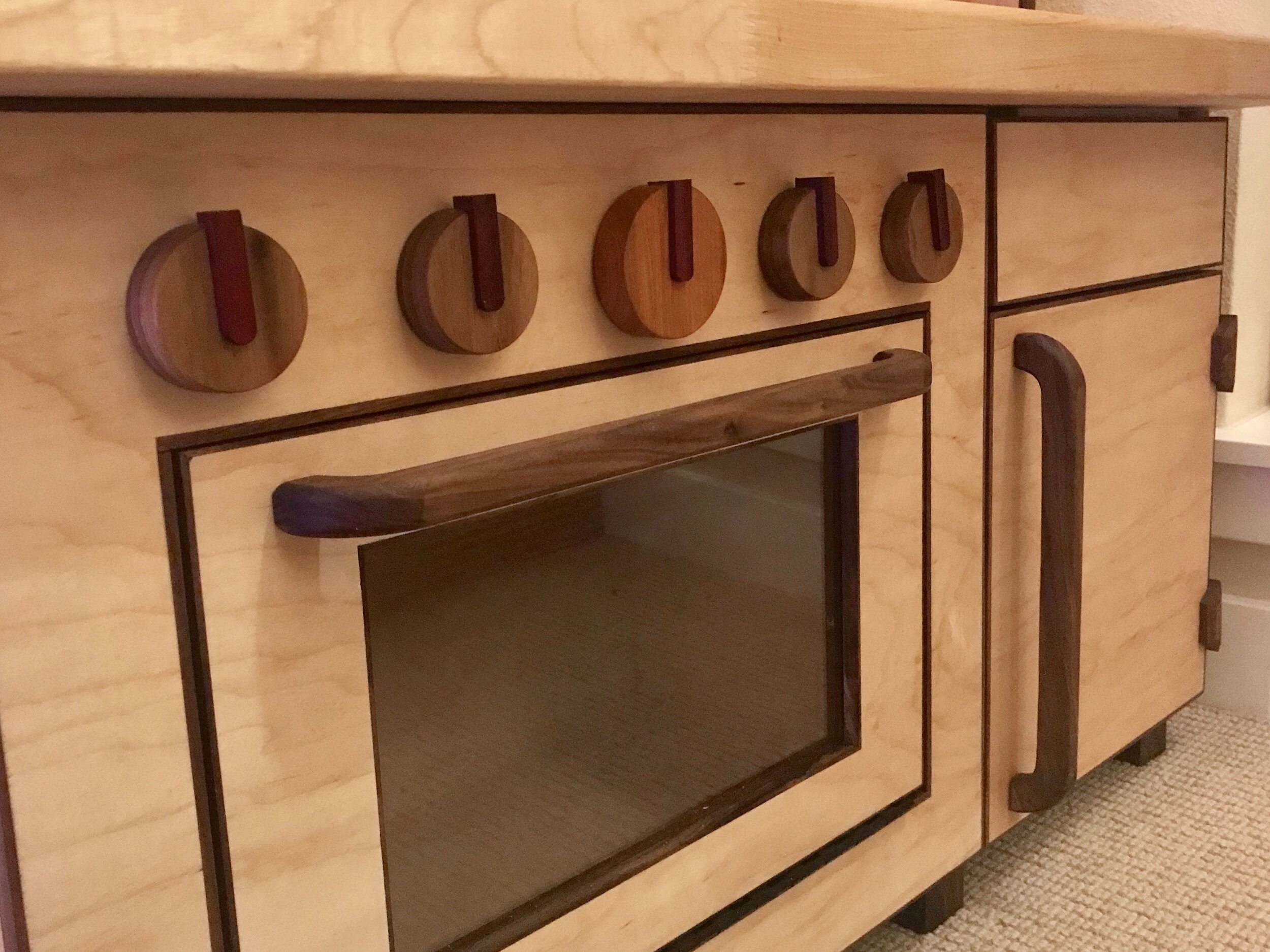 Oven dials contain hidden mechanisms that make a satisfying click when turned.