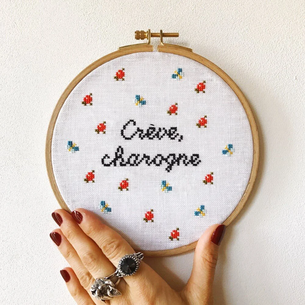 Brode Pute embroidery saying kind of: “Die, carrion” XD