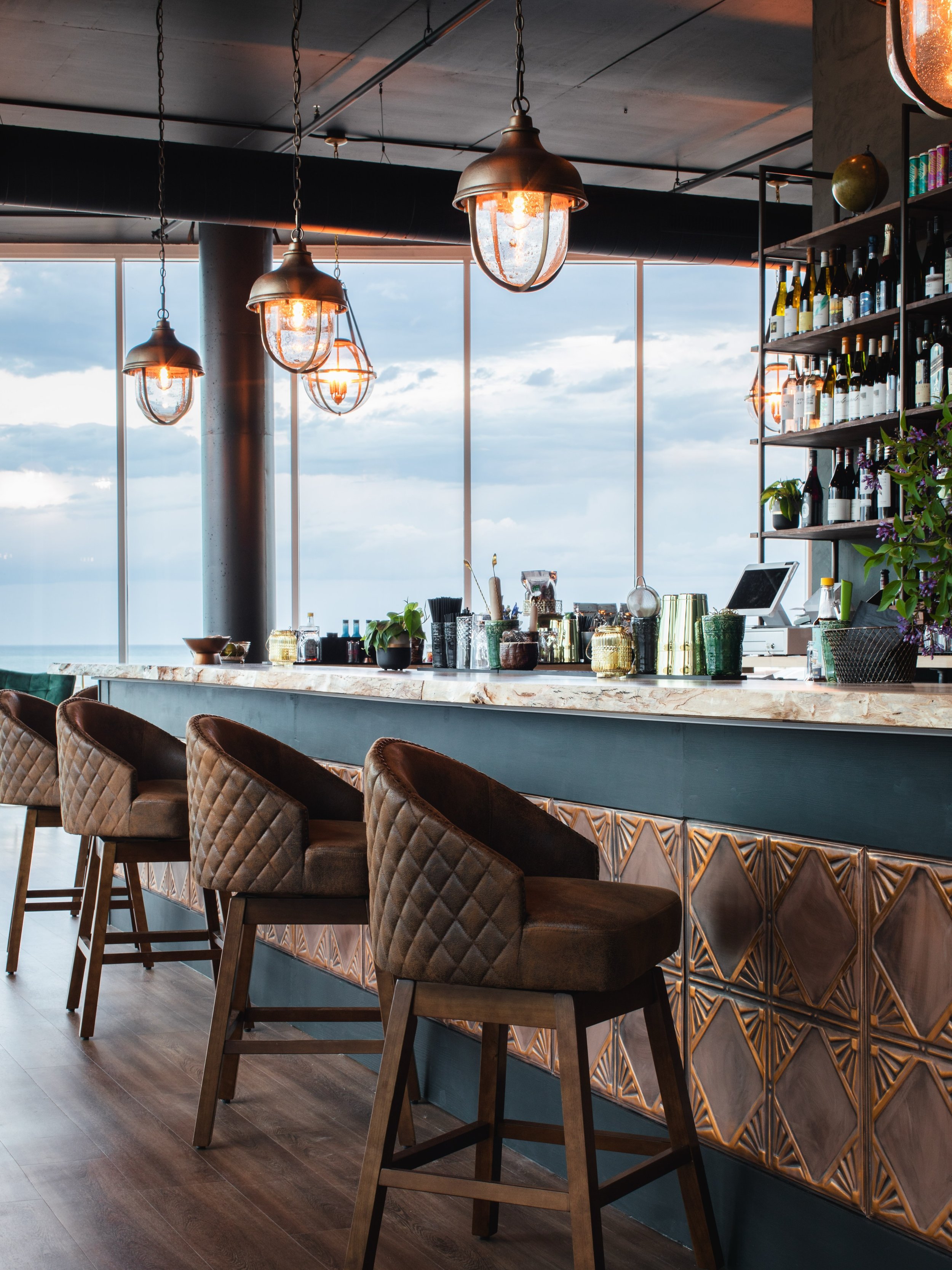 This weekend marks the anniversary of two special client spaces! First up is @cavelierwinebar in Port Washington which turned ✌️this weekend! It&rsquo;s home to the absolute best lake views with the tastiest cocktails, mocktails and wine selection ar
