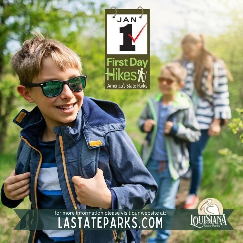 Child wearing sunglasses and hiking jacket on a trail with family, promoting Louisiana State Parks’ First Day Hikes.