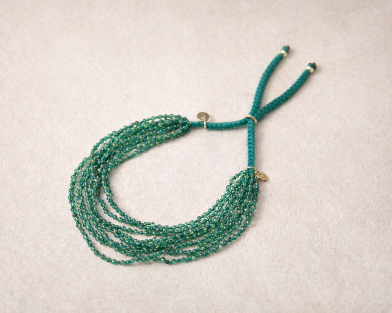 Emerald 9 Strand Bracelet
