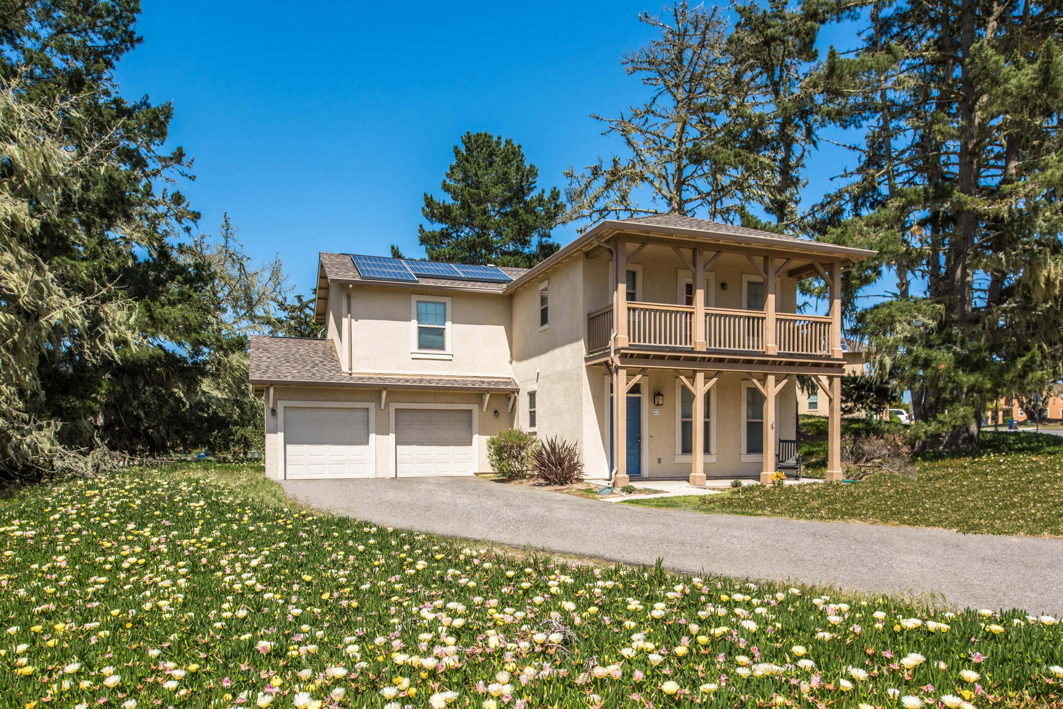 Military housing with lawn space and private garages at The Parks at Monterey. 