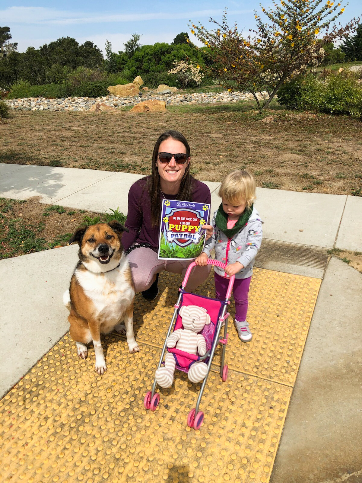 Residents and their families show off their furry friends at our community puppy patrol walk. 