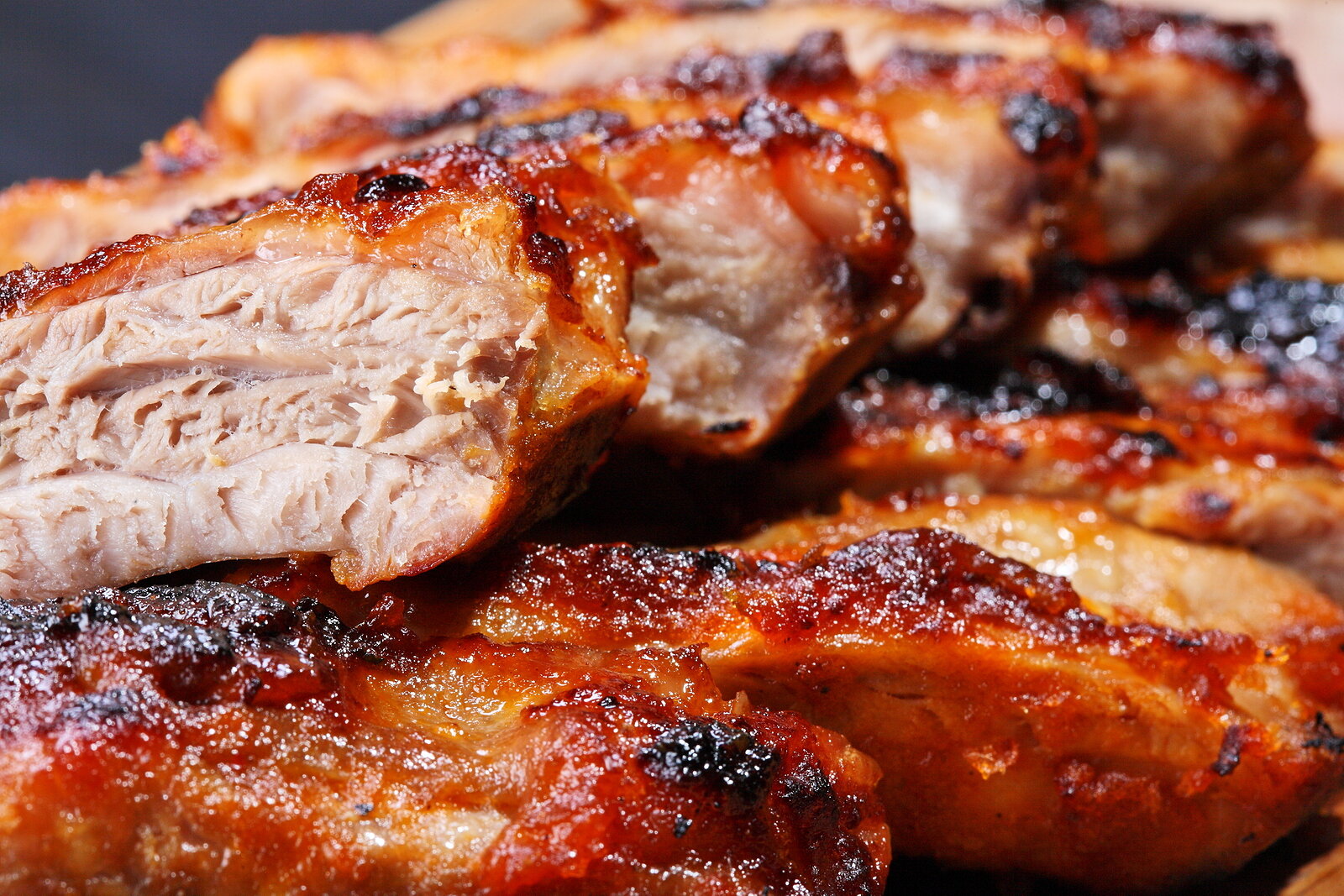 bigstock-Grilled-pork-ribs-on-wooden-pl-26070863.jpg