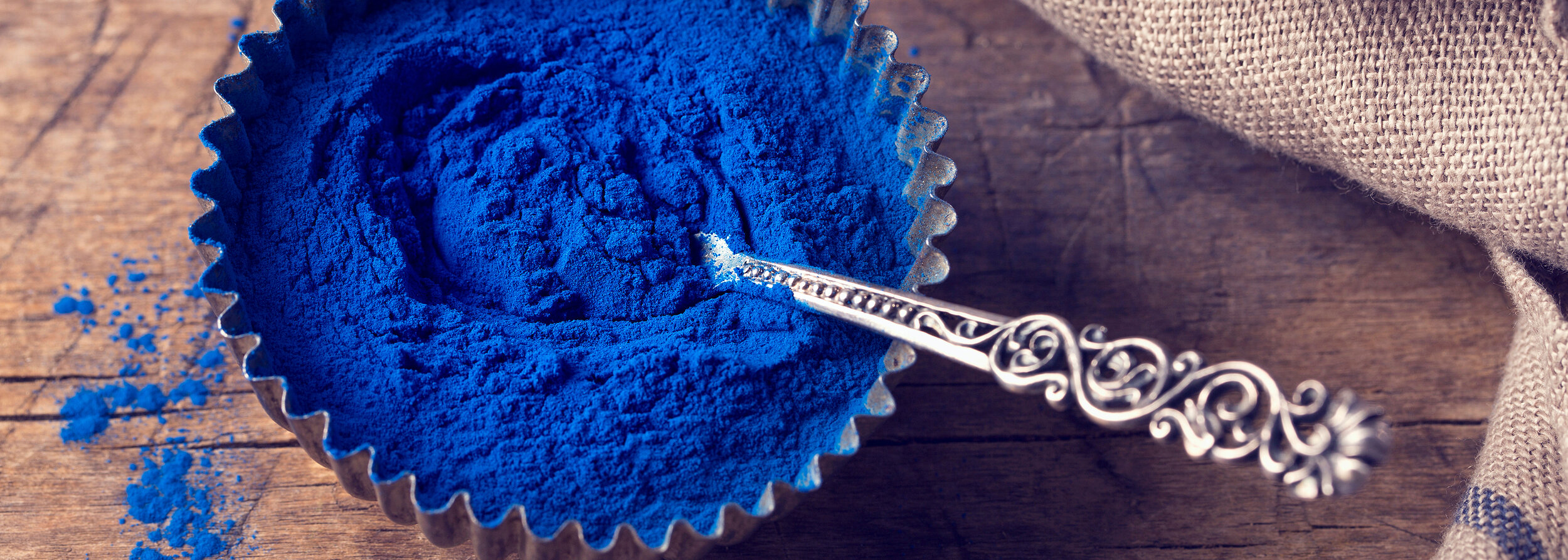 bigstock-Blue-spirulina-powder-in-a-sma-319614088.jpg