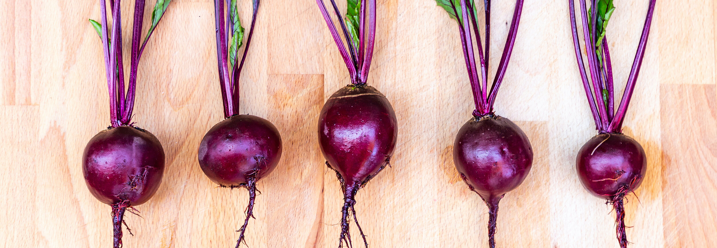 bigstock-Fresh-Harvested-Red-Beets-Cros-375123034.jpg